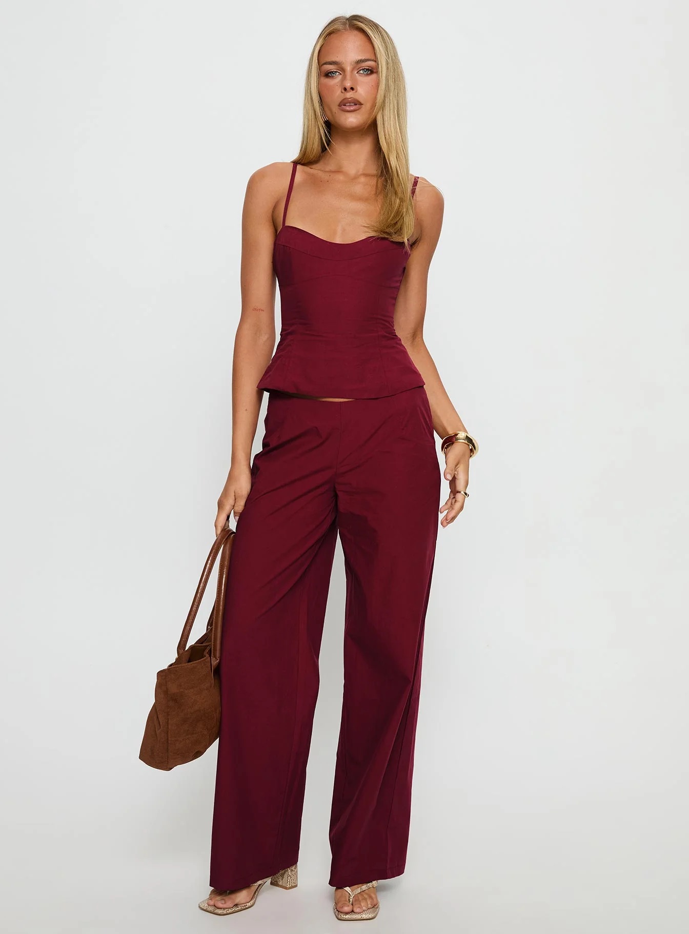 woman wearing red princess polly graduation guest matching set