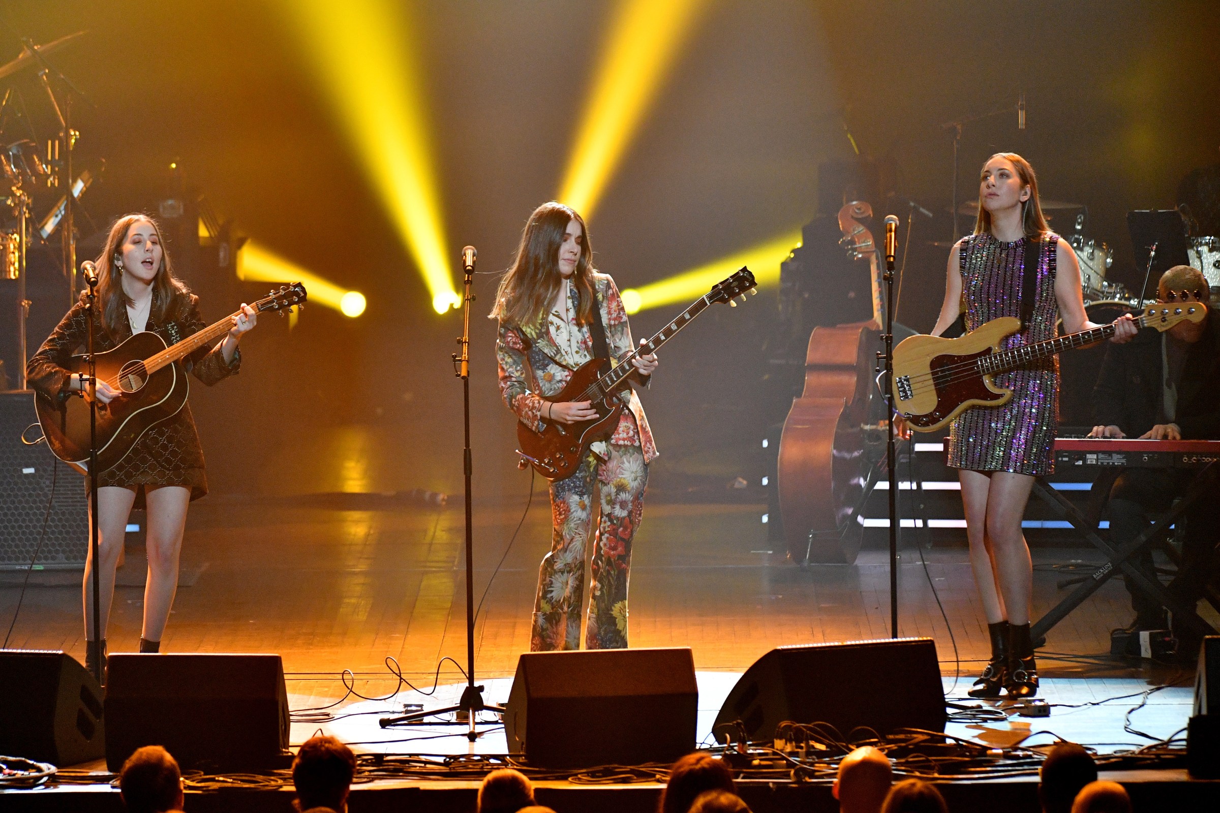 Recording artists Alana Haim, Danielle Haim, and Este Haim of music group Haim performs onstage during MusiCares Person of the Year honoring Fleetwood Mac. Image Courtesy of Recording Academy®/Photo Dia Dipasupil by Getty Images© 2021
