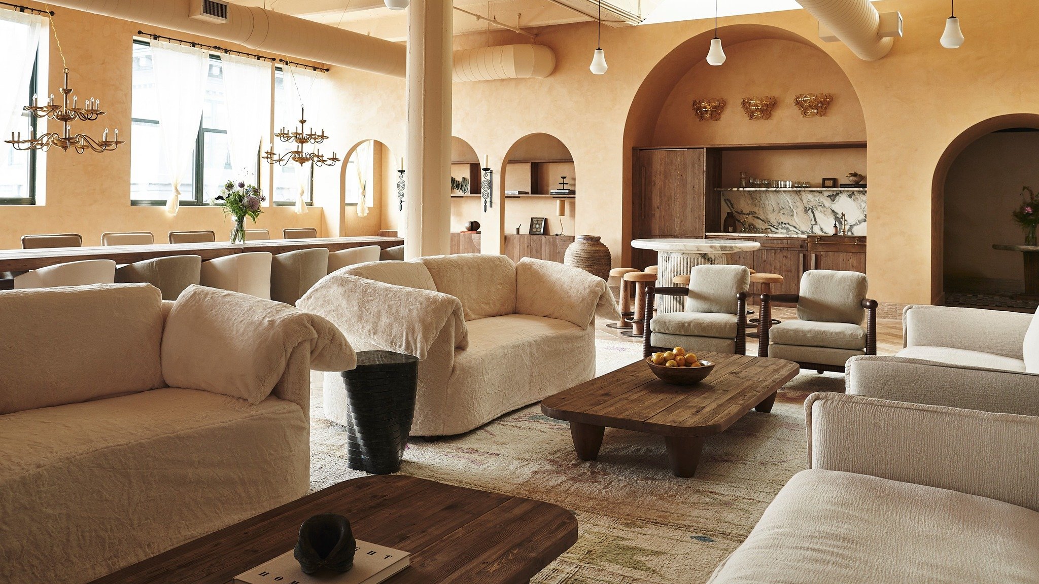 Sixpenny sofas, chairs, and tables placed in the Sixpenny loft