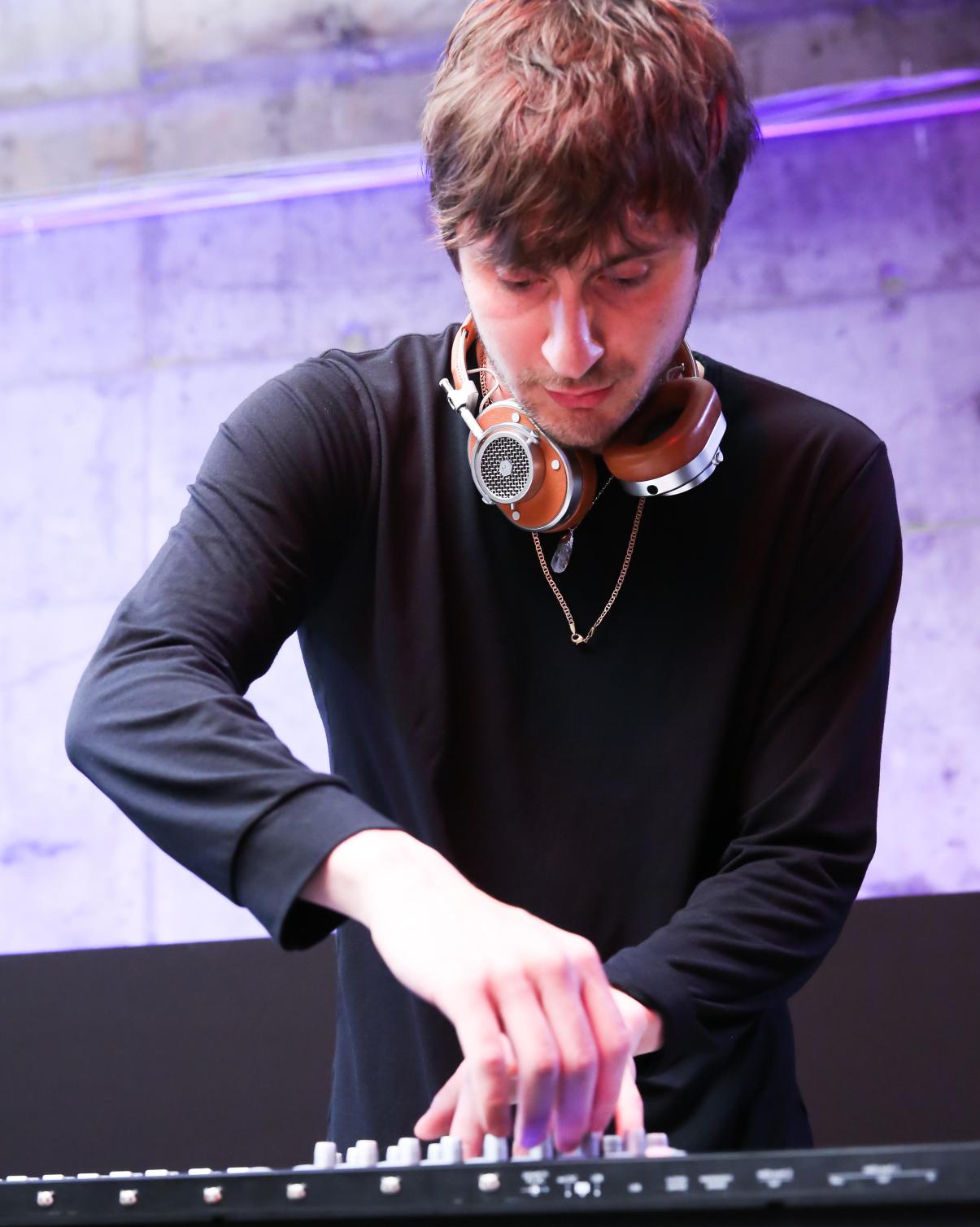 Photograph of a DJ at The Master & Dynamic Launch Event