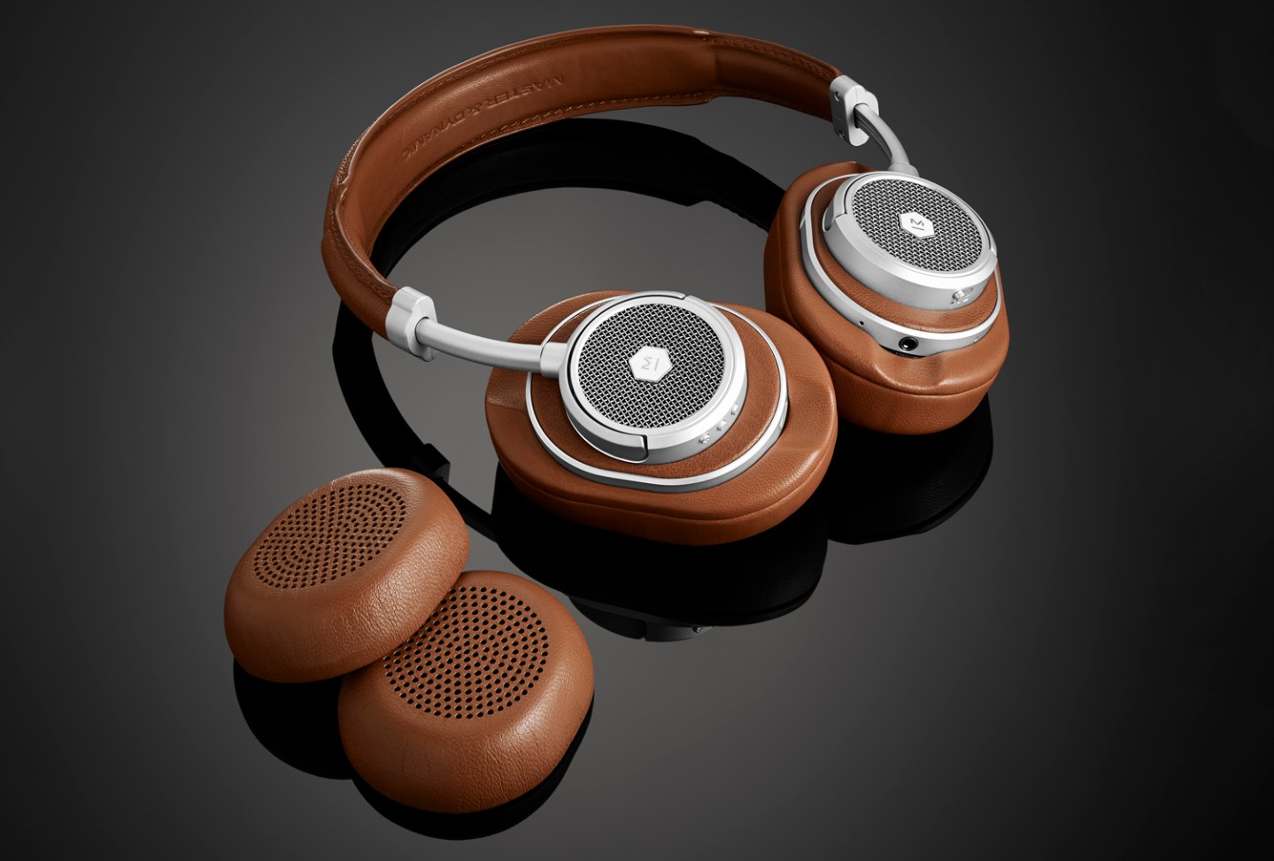 MW50+ Wireless On + Over-Ear Headphones in silver metal / brown leather.