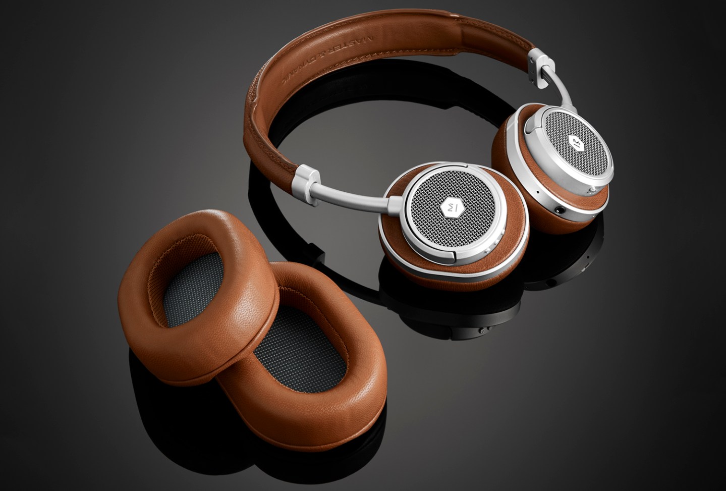 MW50+ Wireless On + Over-Ear Headphones in silver metal / brown leather.