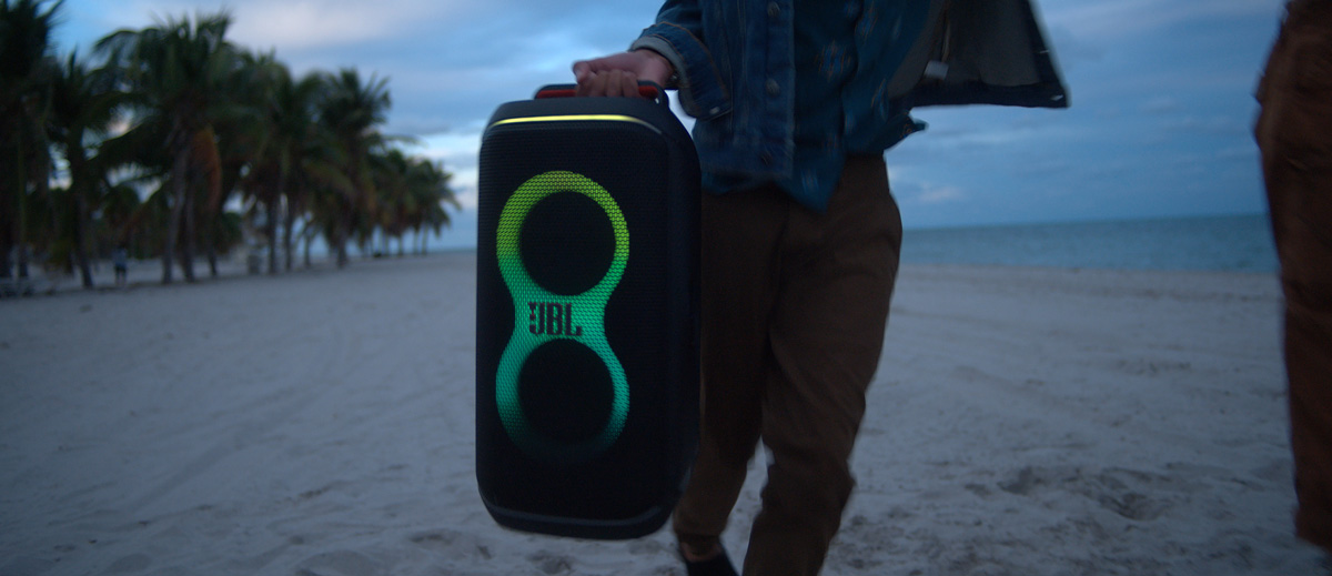 JBL Partybox Club 120 being carried by the handle