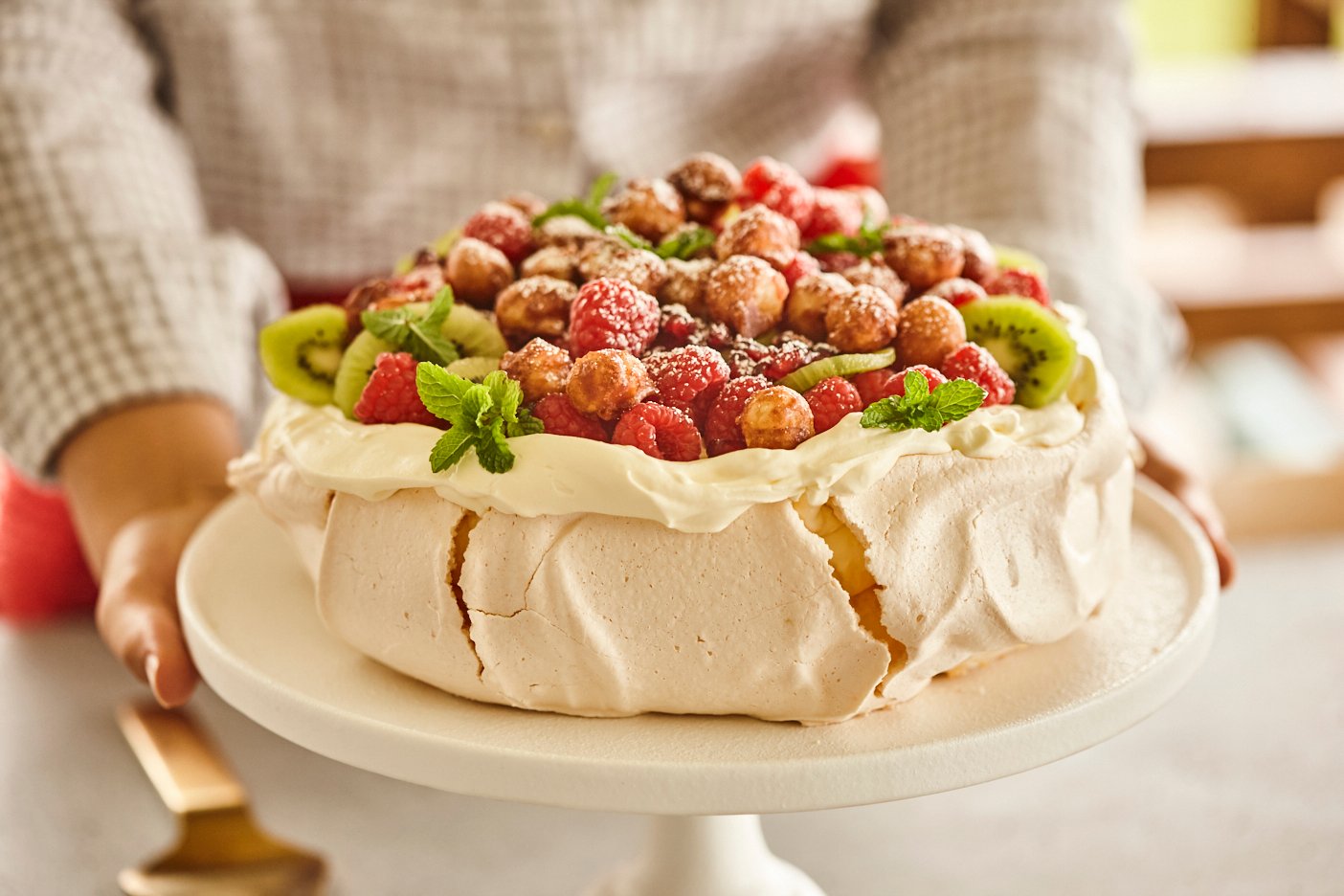 Brookfarm Pavlova with  seasonal fruits  and candied  macadamias