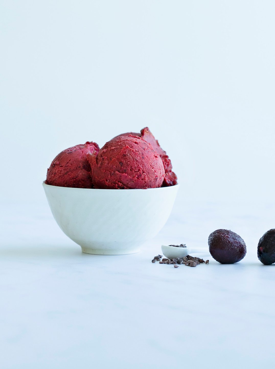 a white bowl with scoops of Cherry Cacao Bliss Sorbet