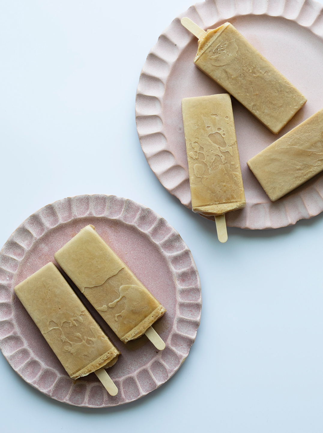 Tahini Oat Latte Popsicles on plates