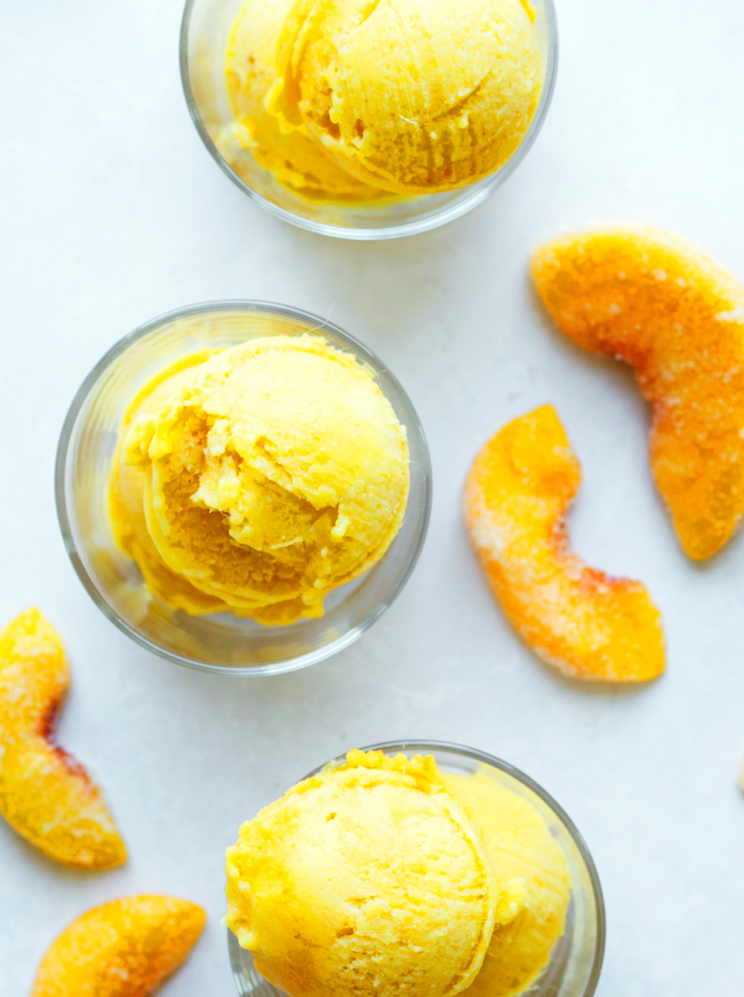 Overhead shot of 3 cups with scoops of Summer Peach Sorbet