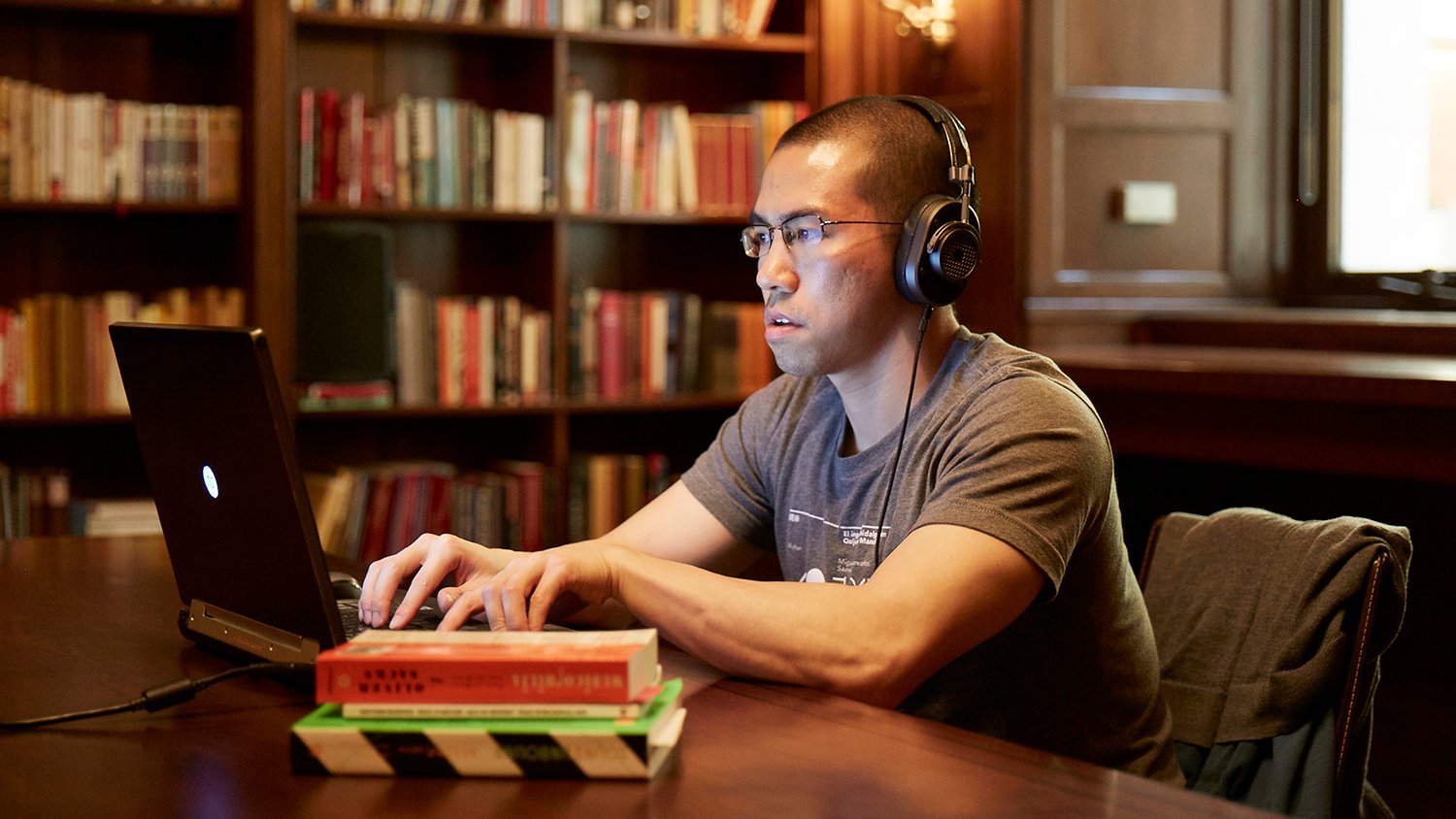 Brian Foo Photographed on a laptop