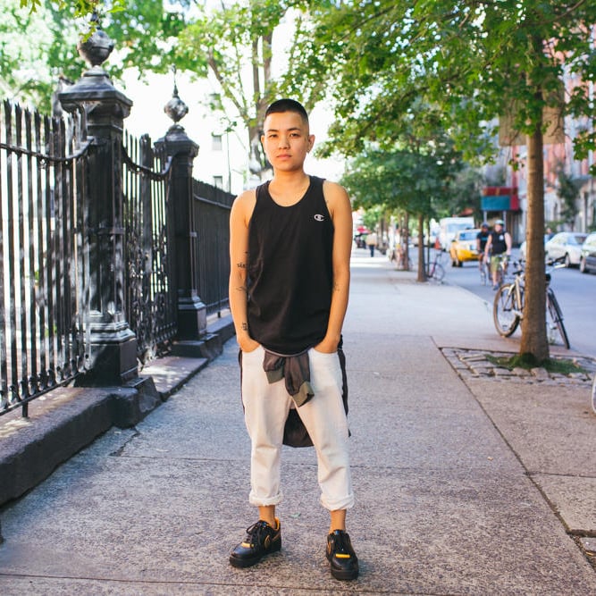 Christelle on Mott Street in SoHo reflecting on her creative roots.
