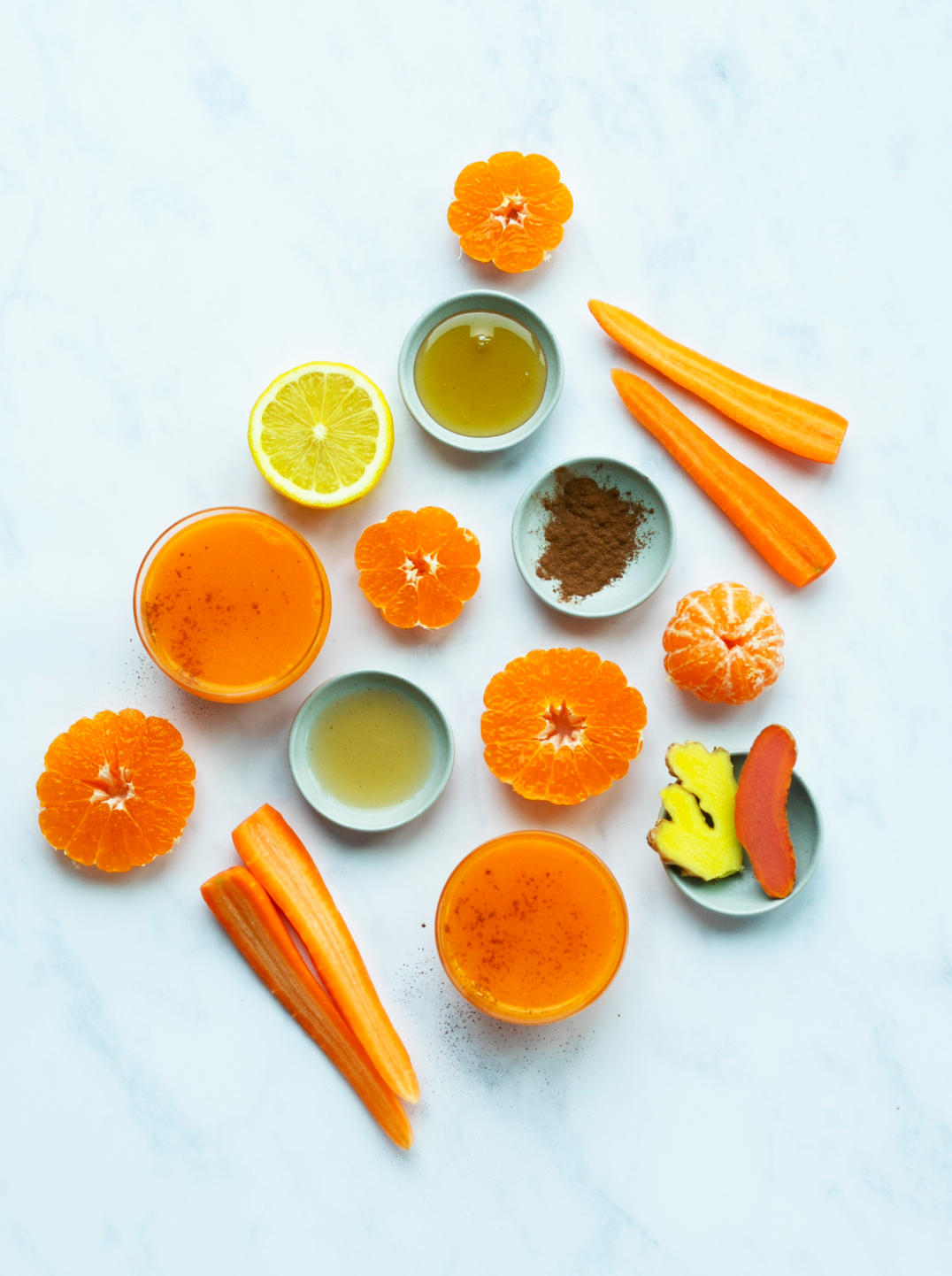 2 glasses of spice shield immunity blend with ingredients
