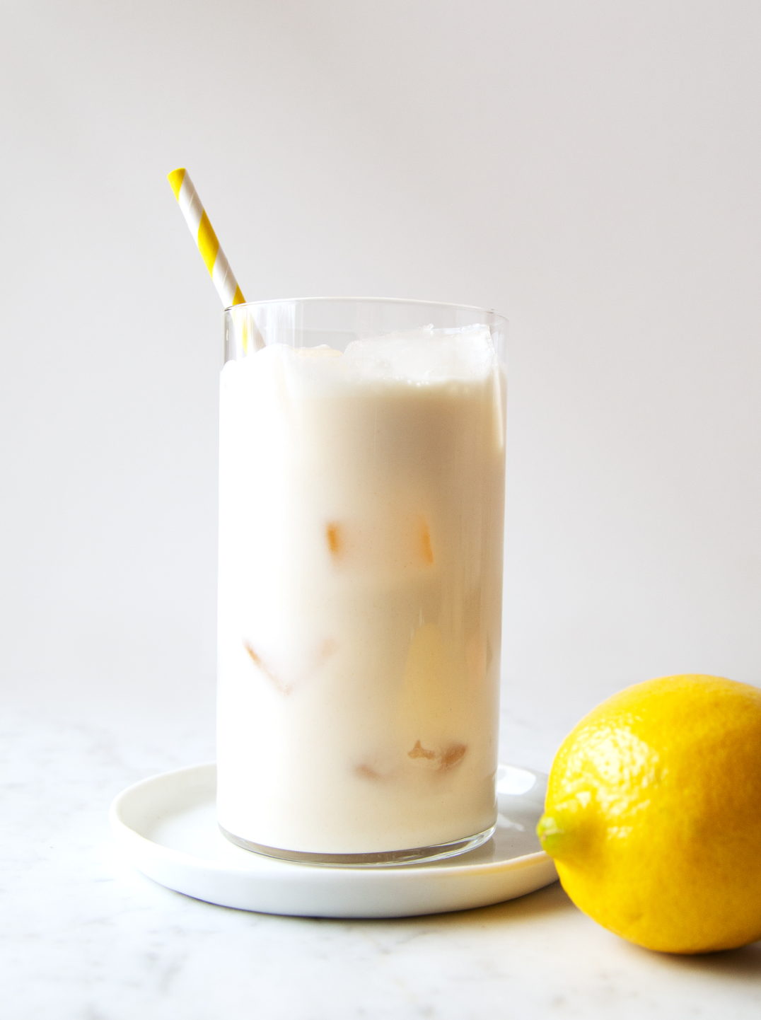 a glass of creamy cashew lemon milk