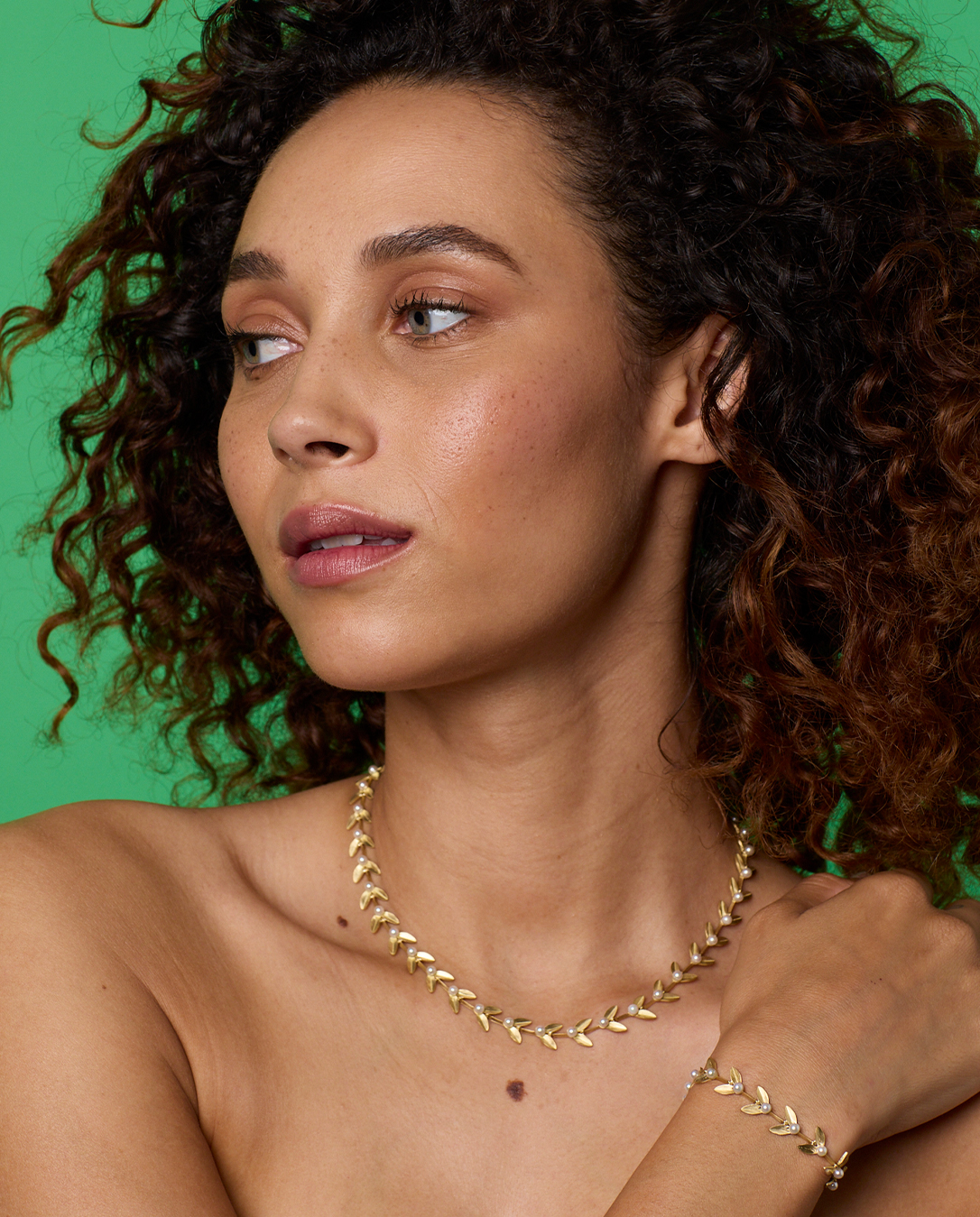 New leaf-like links take shape as elegant bracelets and necklaces.SHOP GOLDEN BLOSSOM VINES