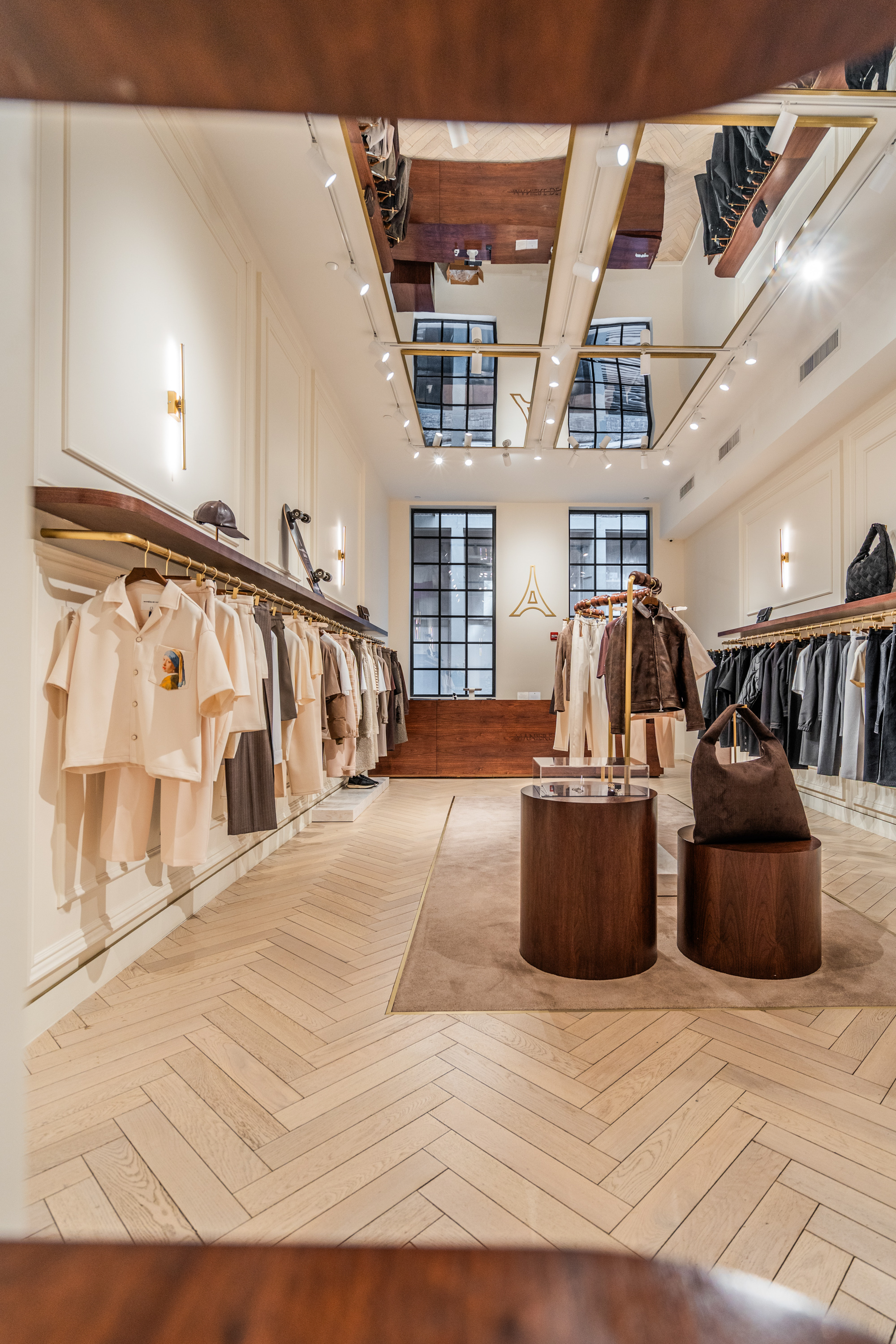 Custom hardwood flooring detail at Maniere de Voir NYC boutique installed by PID Floors