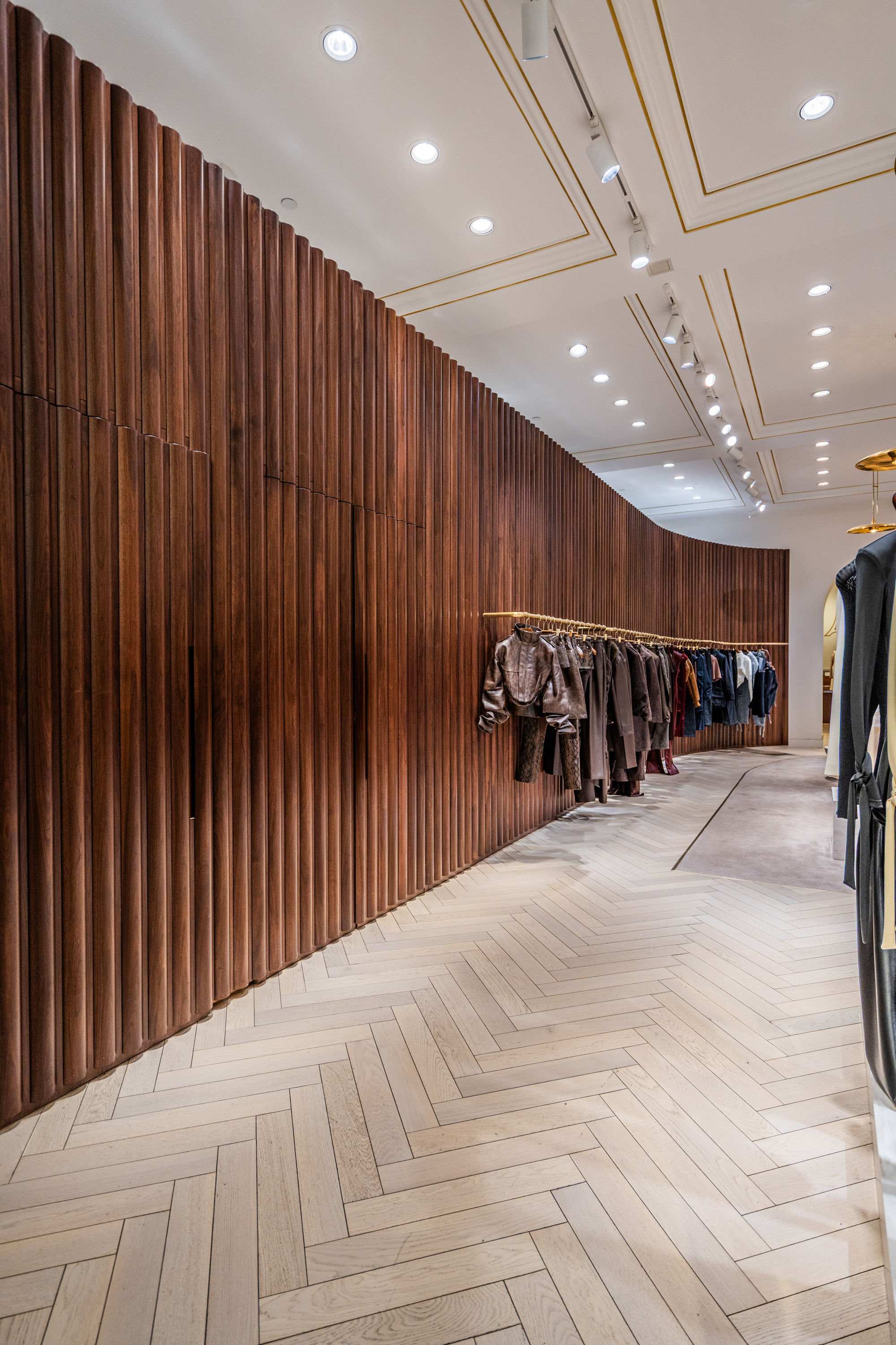PID Floors luxury hardwood installation detail at Maniere de Voir high-end retail environment