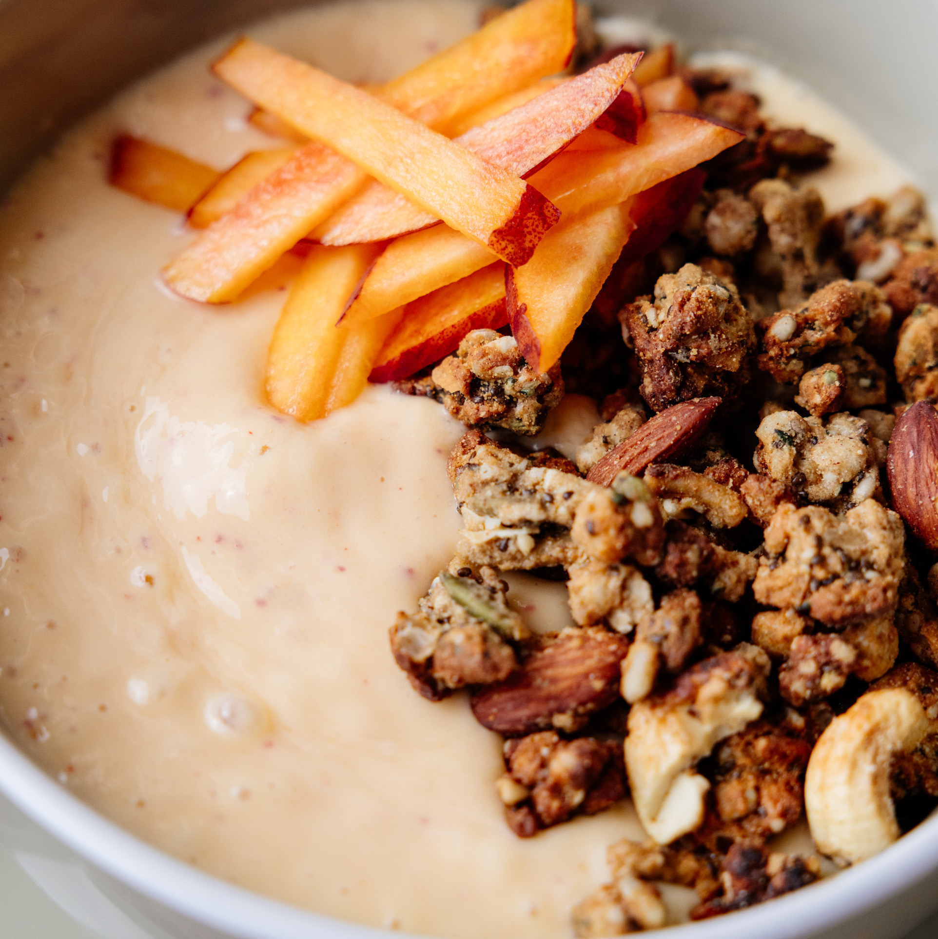 High Protein Peach & Mango Smoothie Bowl