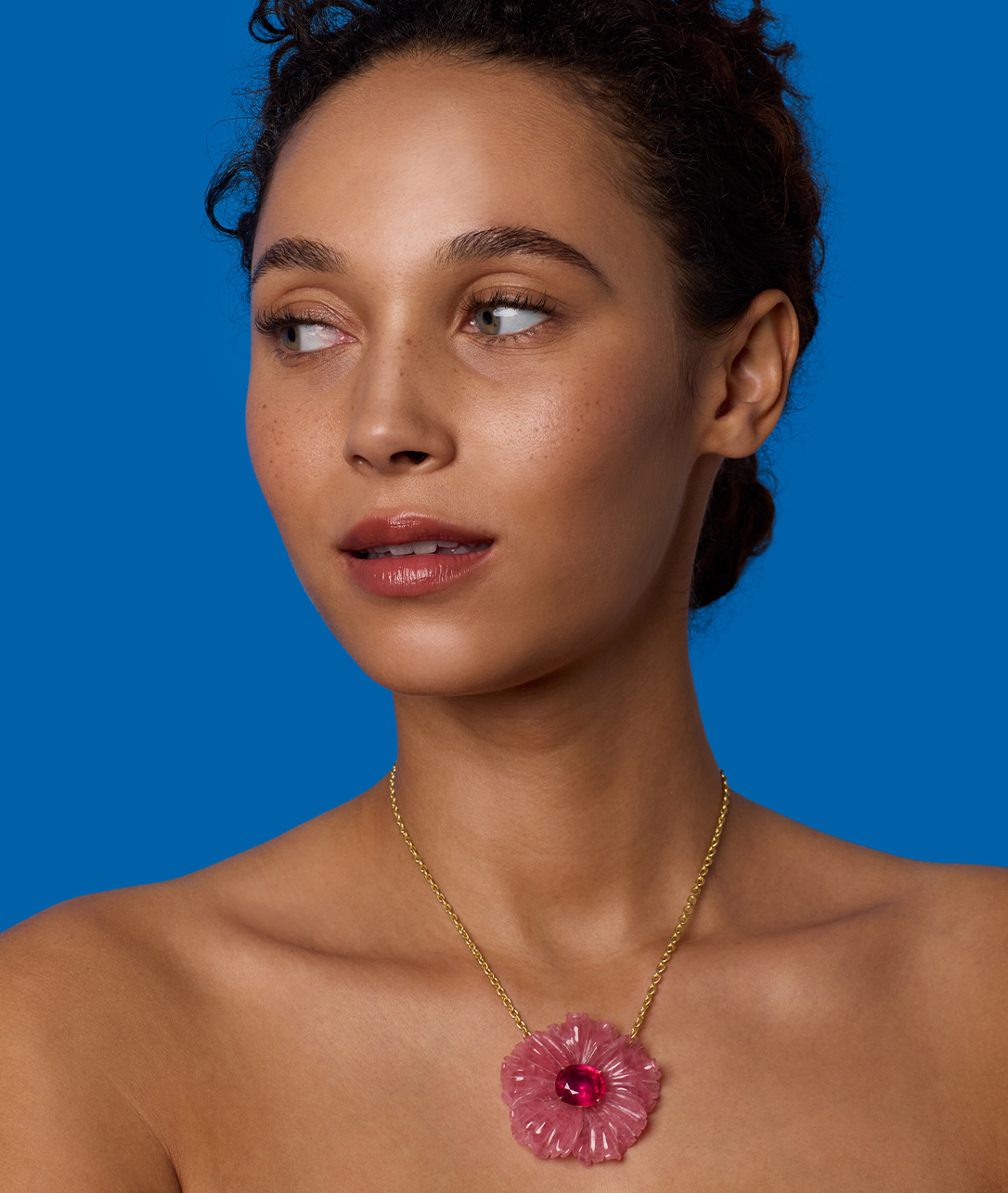 Warm and deeply rosy, made to be worn all summer long.