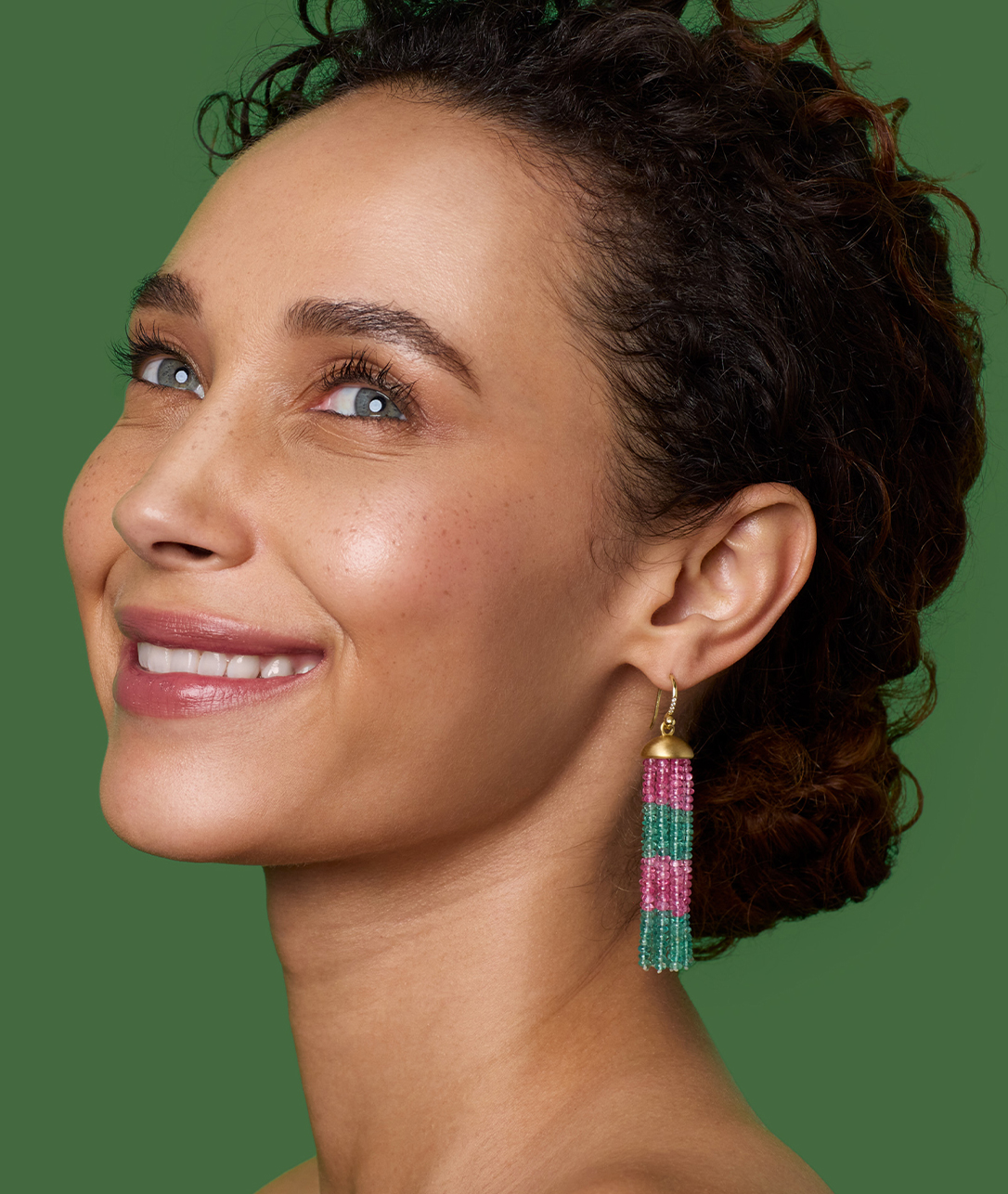Spinel and emerald beads that carry all the joy of a slice of watermelon.SHOP TASSELS