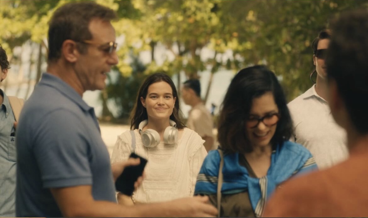 Piper Ratliff (portrayed by Sarah Catherine Hook) arrives to The White Lotus wearing the MW75 Wireless Headphones in Silver Metal + Grey Leather 
