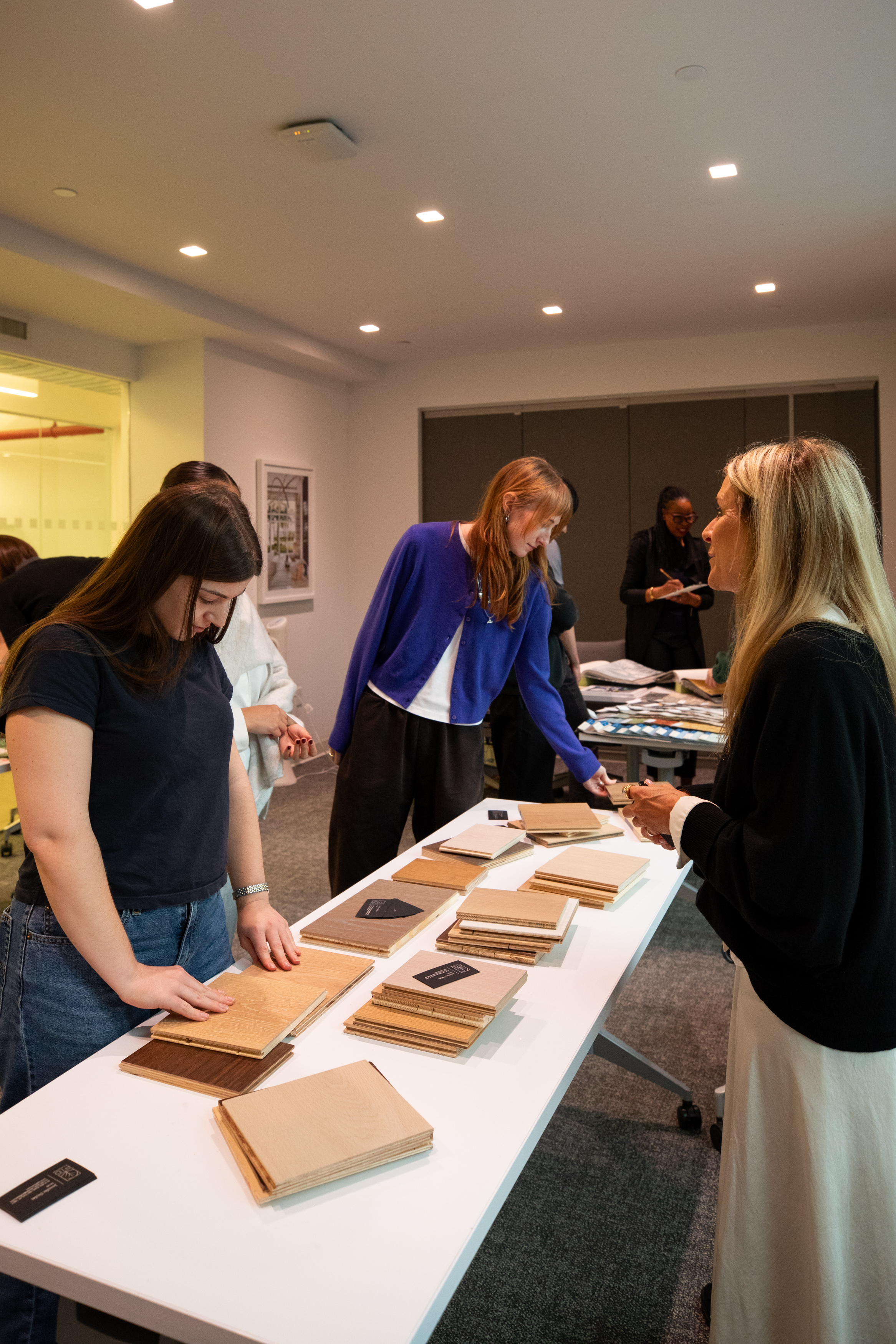 Design professionals viewing flooring samples at Pembrooke and Ives vendor event