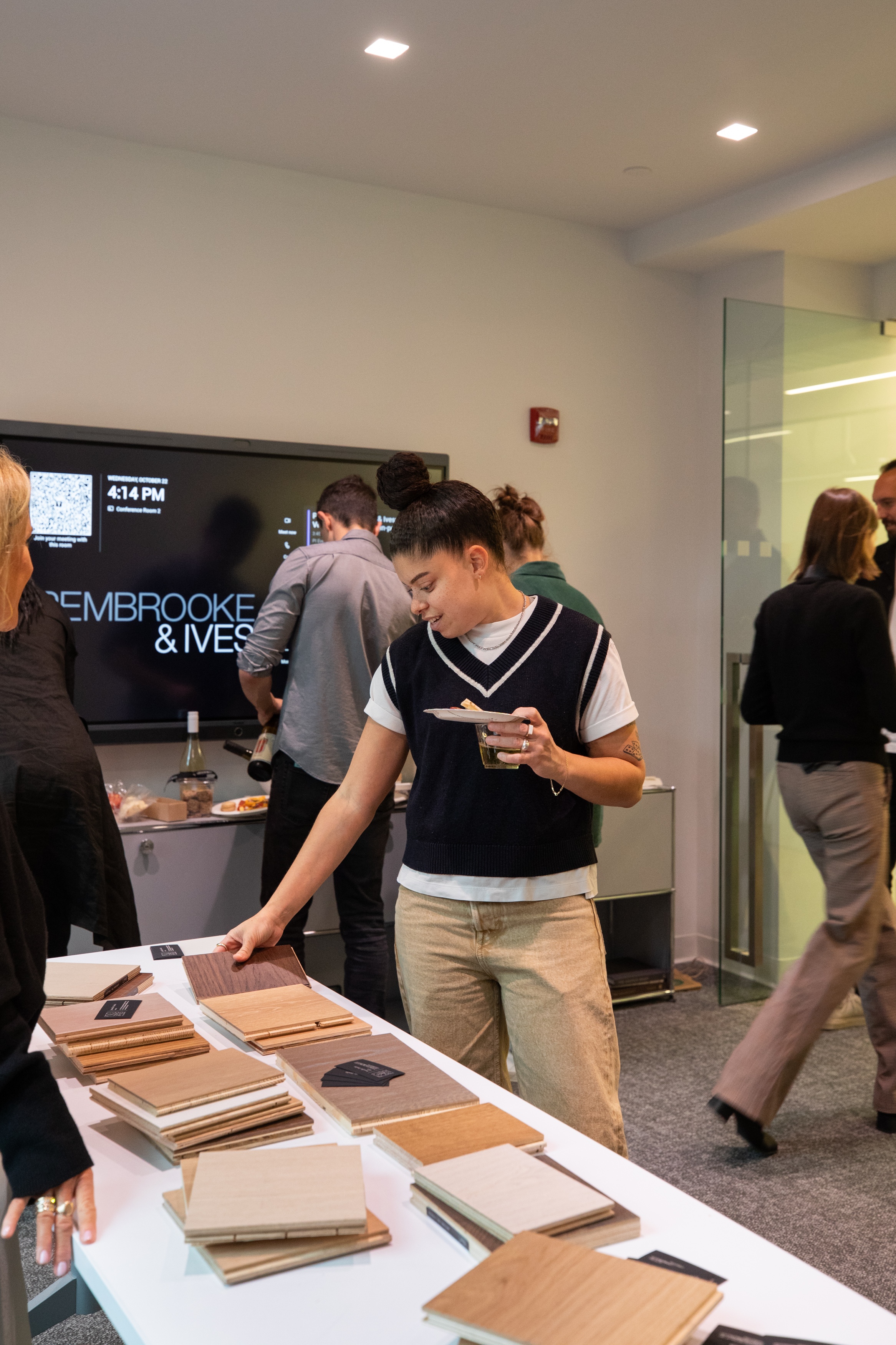 Pembrooke and Ives Team viewing flooring samples by PID Floors