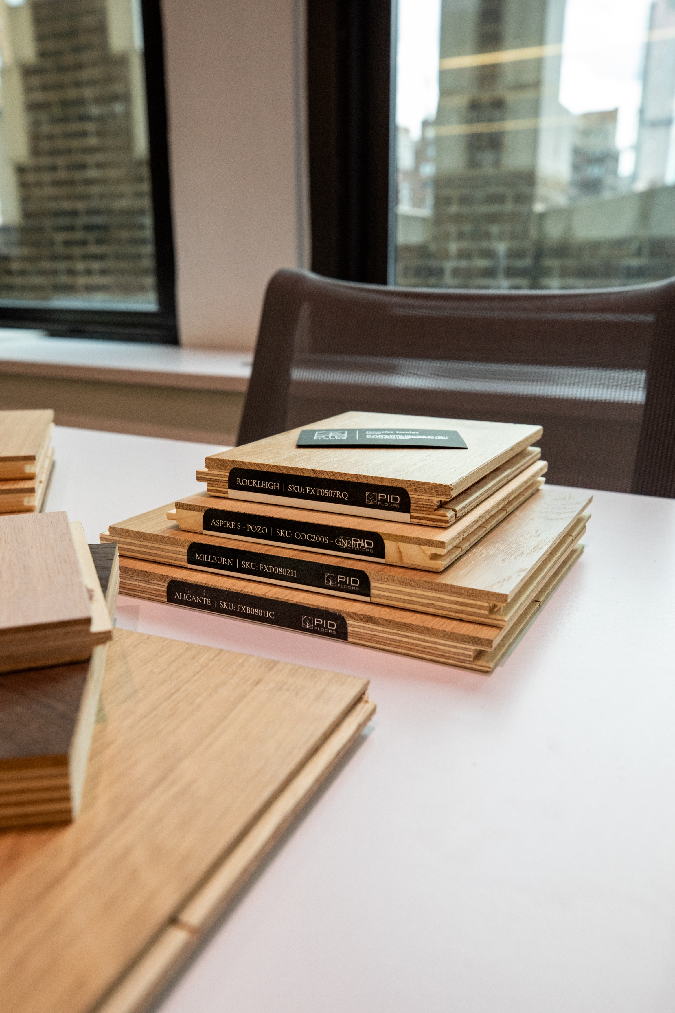 Close up of premium hardwood samples at Pembrooke and Ives event