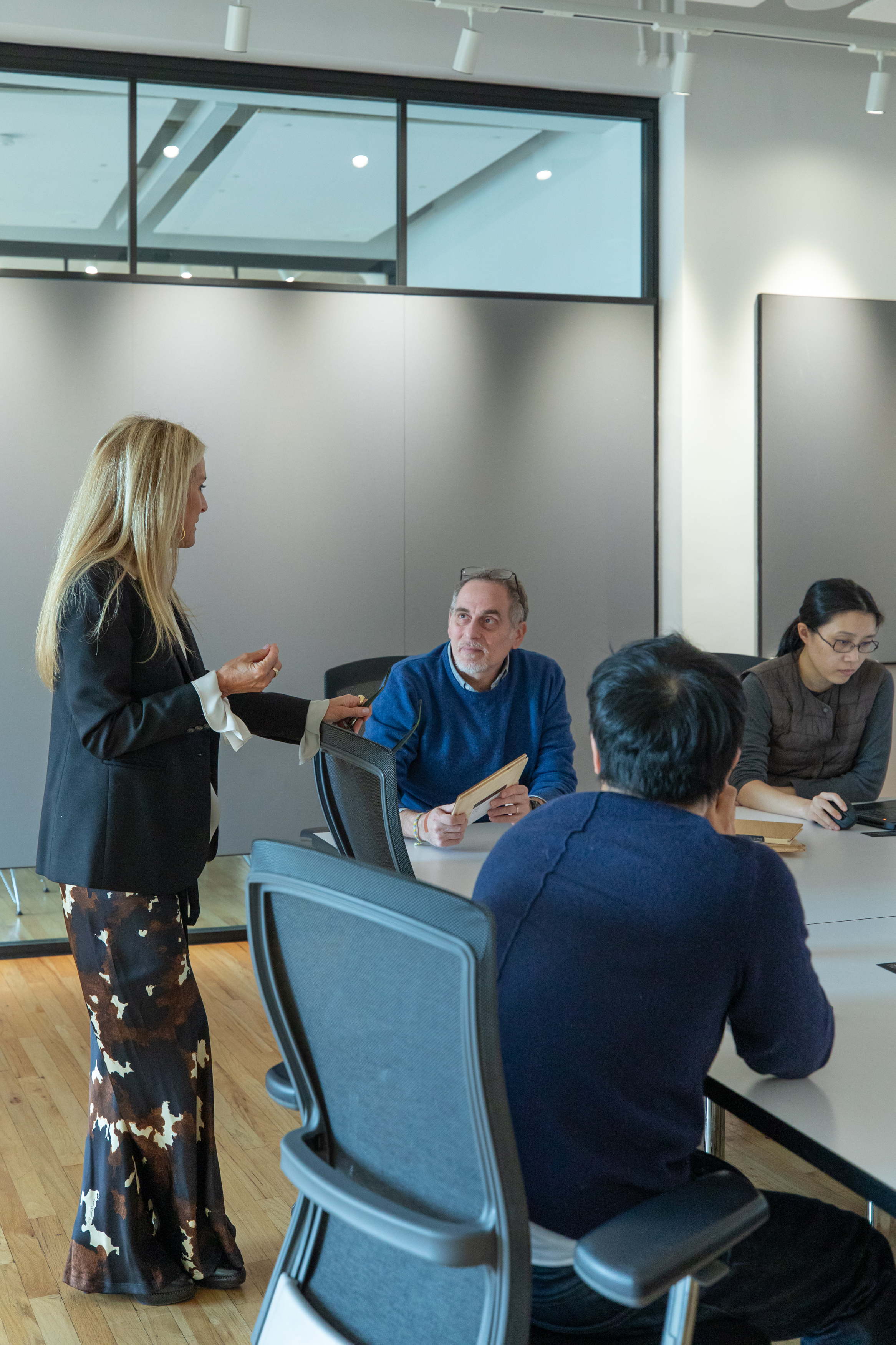 Studios Architecture designers reviewing innovative flooring at PID Floors event