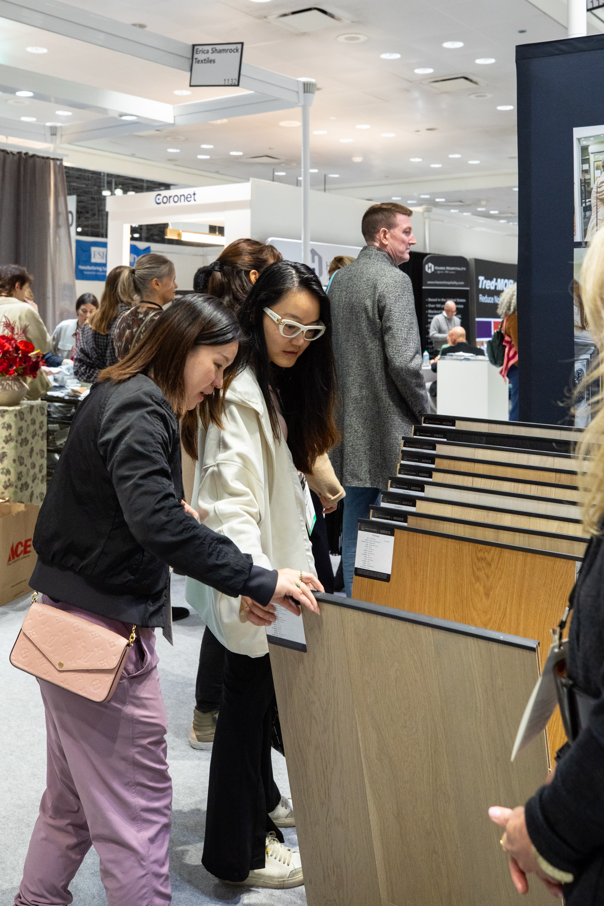 Premium hardwood flooring collection displayed at PID Floors BDNY 2025 booth featuring innovative finishes and designer color palettes