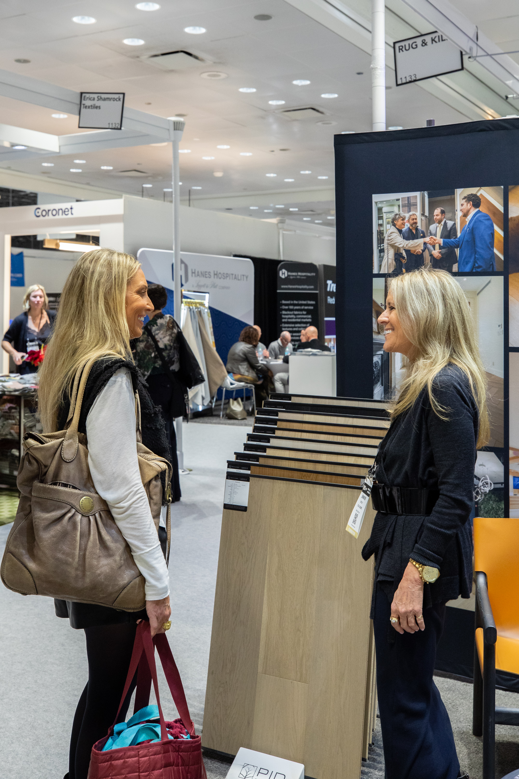 PID Floors booth at Boutique Design New York BDNY 2025 trade show featuring brand signage and premium flooring display entrance