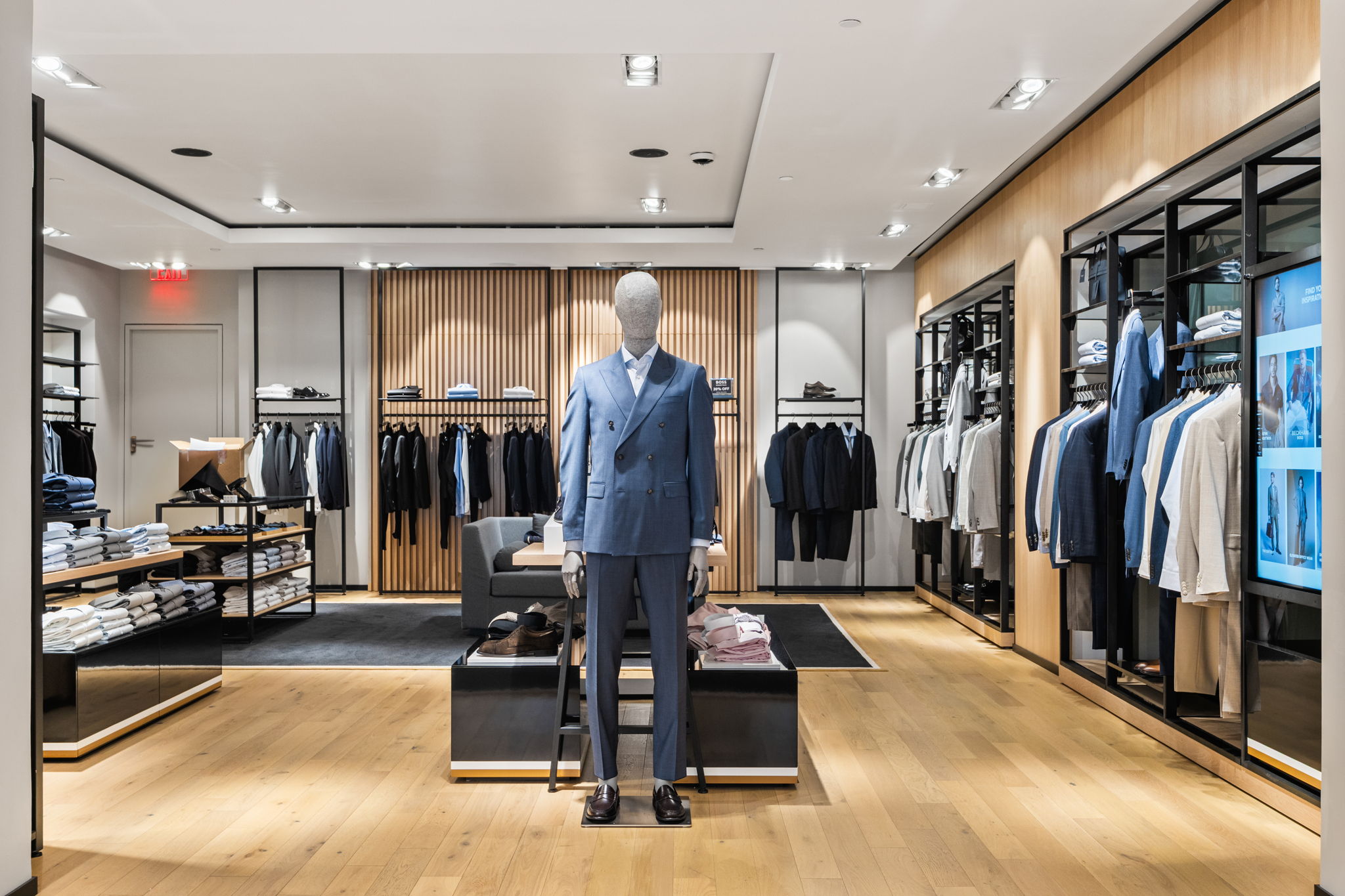 PID Floors bespoke European oak flooring Hugo Boss Coral Gables sophisticated menswear retail interior installation