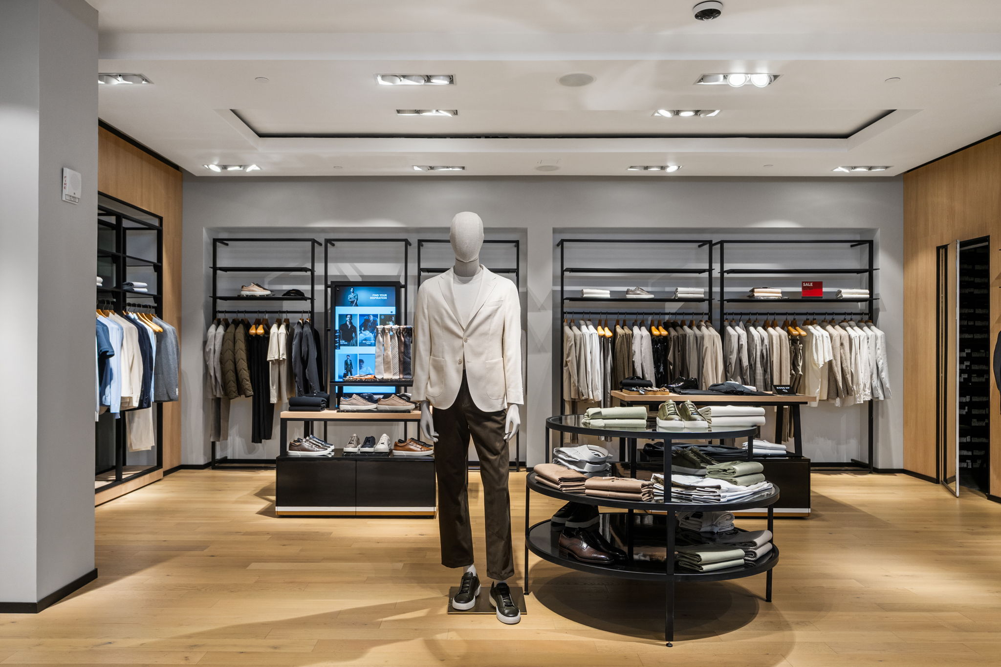 Wide plank hardwood floors by PID Floors Hugo Boss Coral Gables luxury boutique retail environment