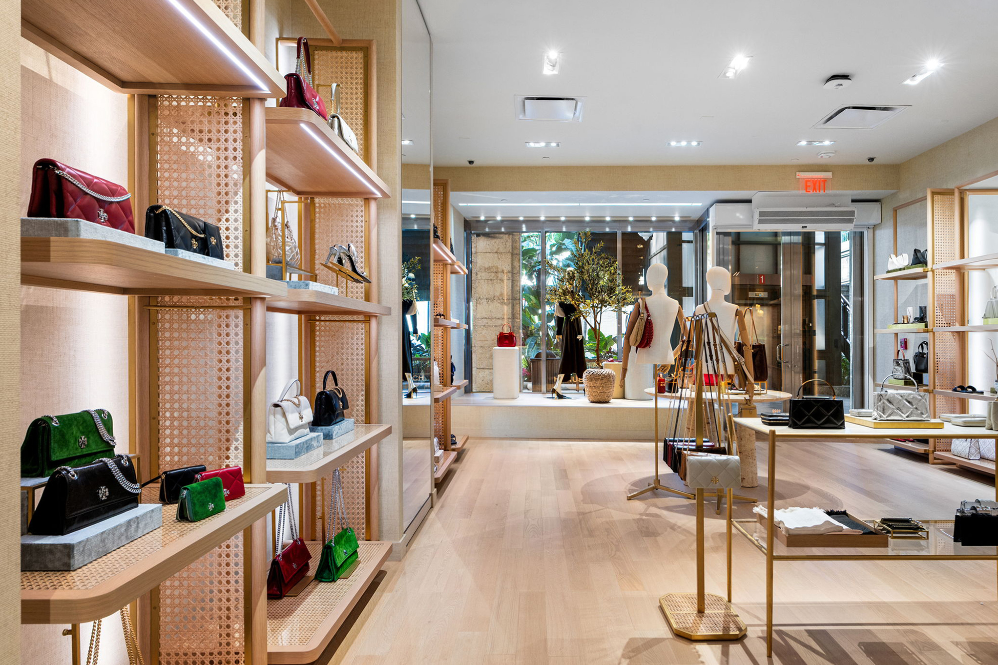 PID Floors luxury hardwood flooring Tory Burch Coral Gables boutique premium fashion retail installation Miami
