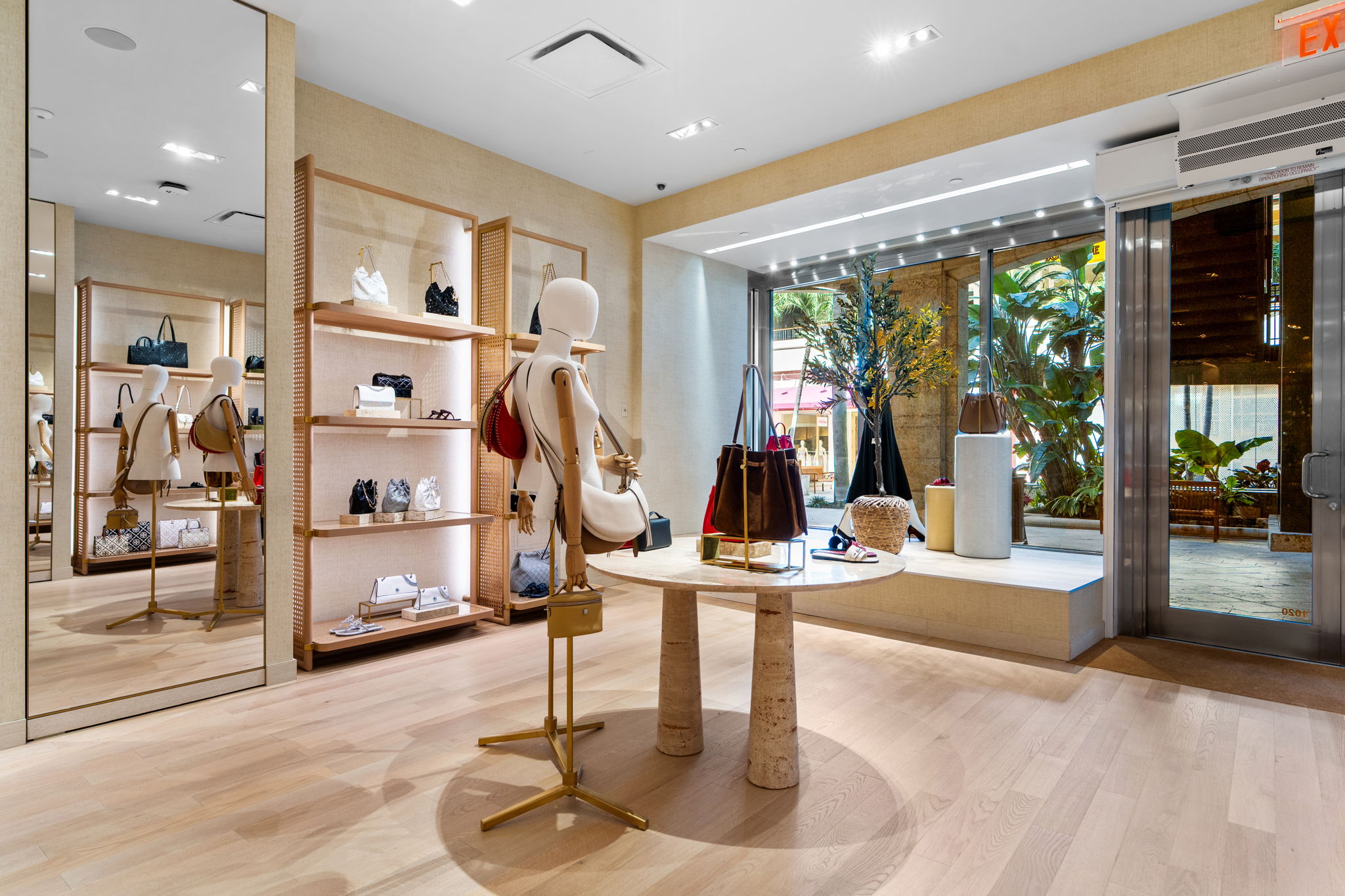European oak wide plank flooring PID Floors Tory Burch Coral Gables luxury brand retail space craftsmanship
