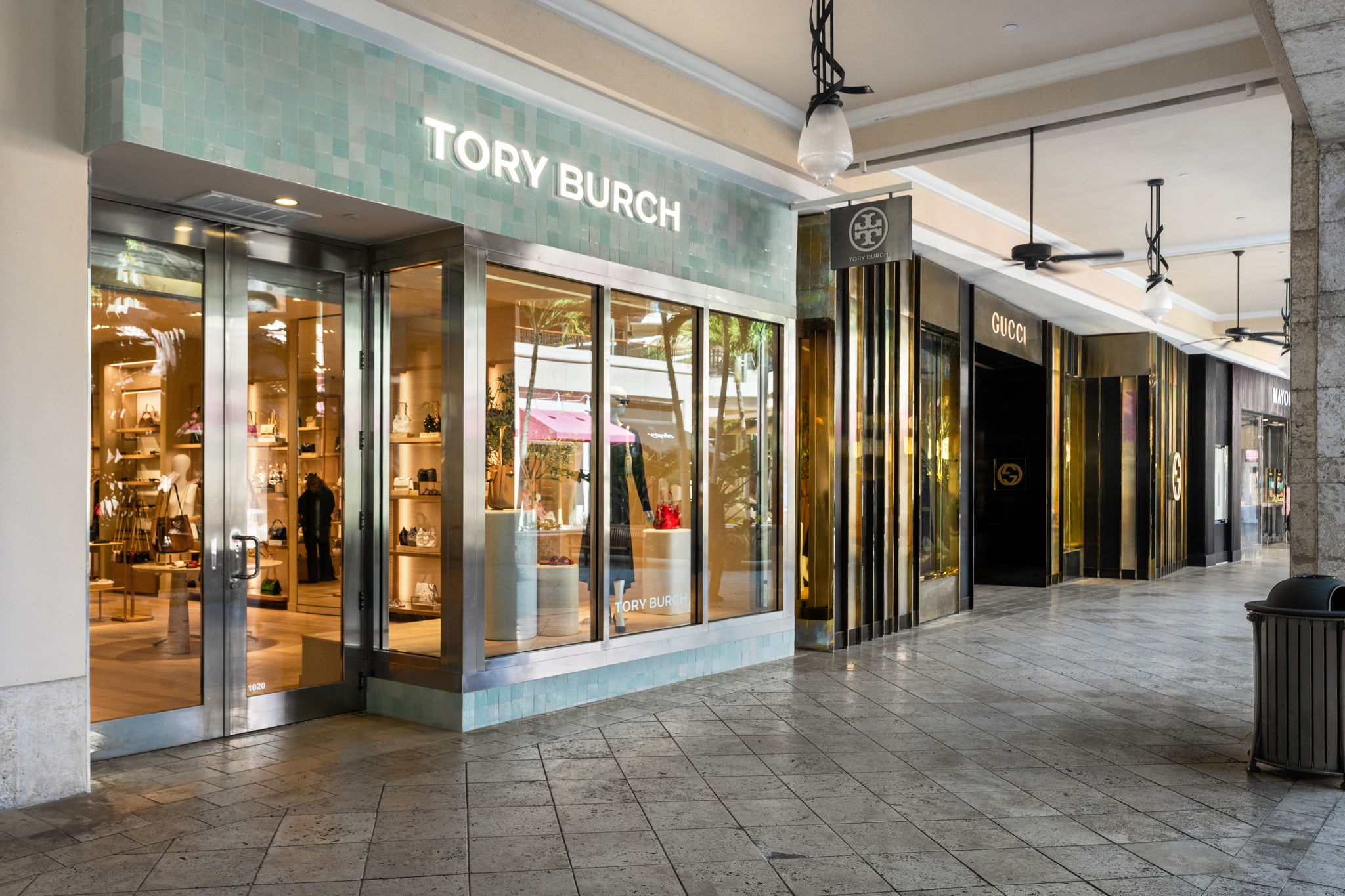 PID Floors artisan European oak flooring installation Tory Burch Coral Gables luxury fashion retail boutique interior detail