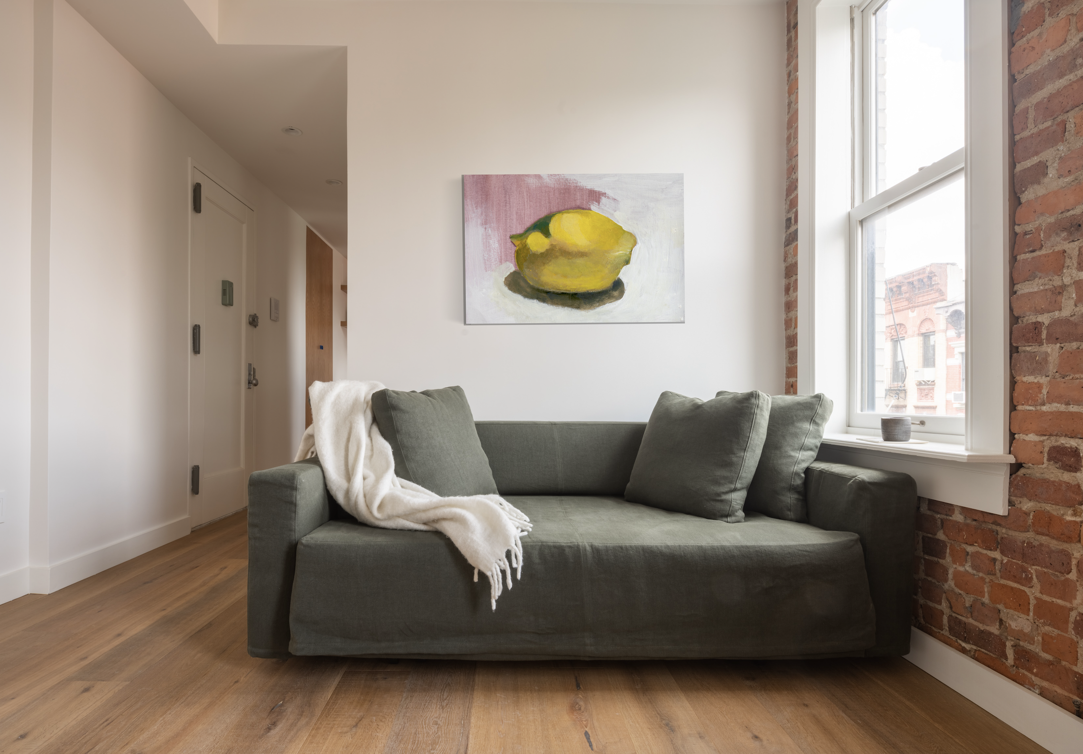 Open-concept pied-à-terre with PID Floors hardwood flooring — downtown Manhattan