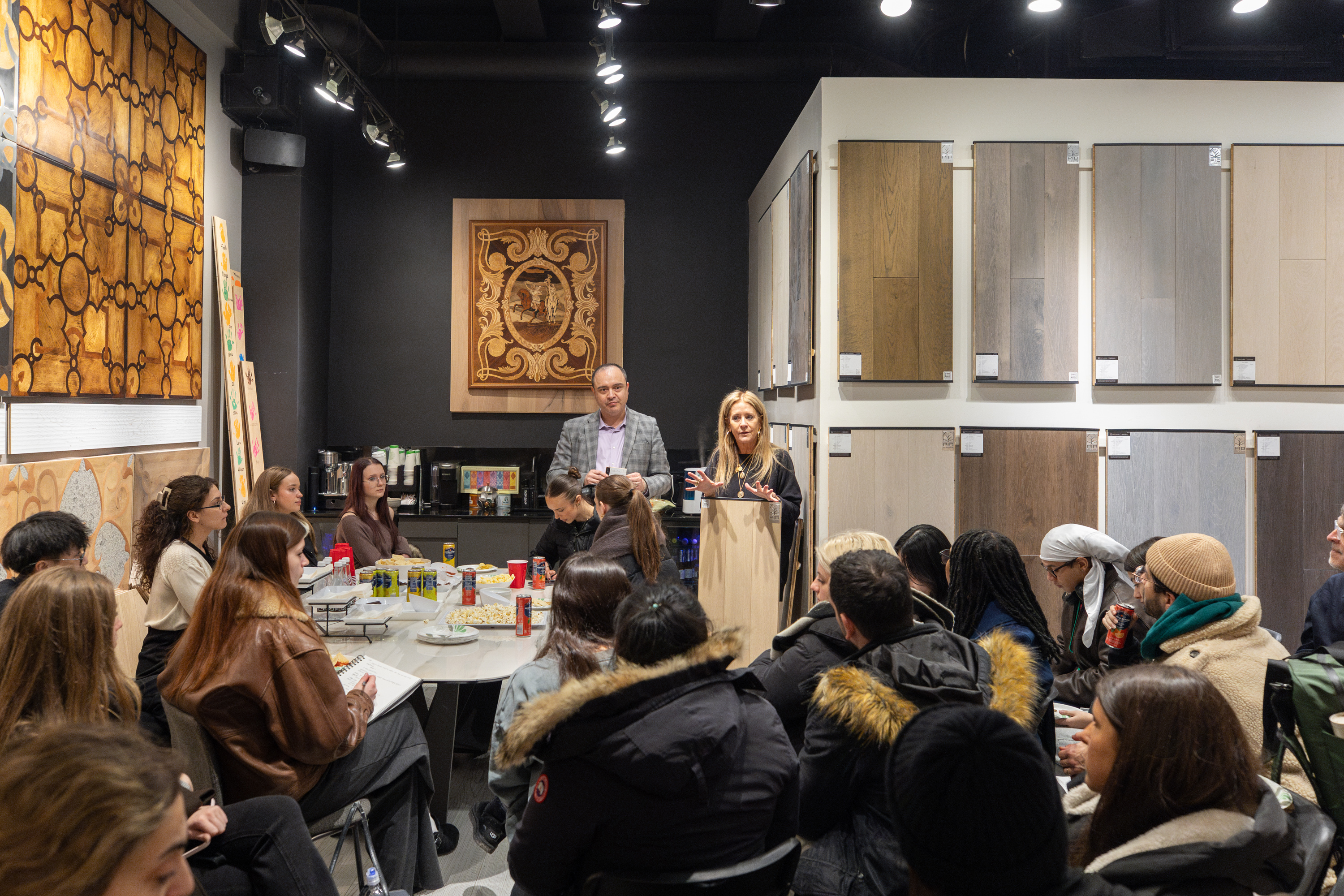 FIT design students arriving at PID Floors NYC flagship showroom entrance, Manhattan