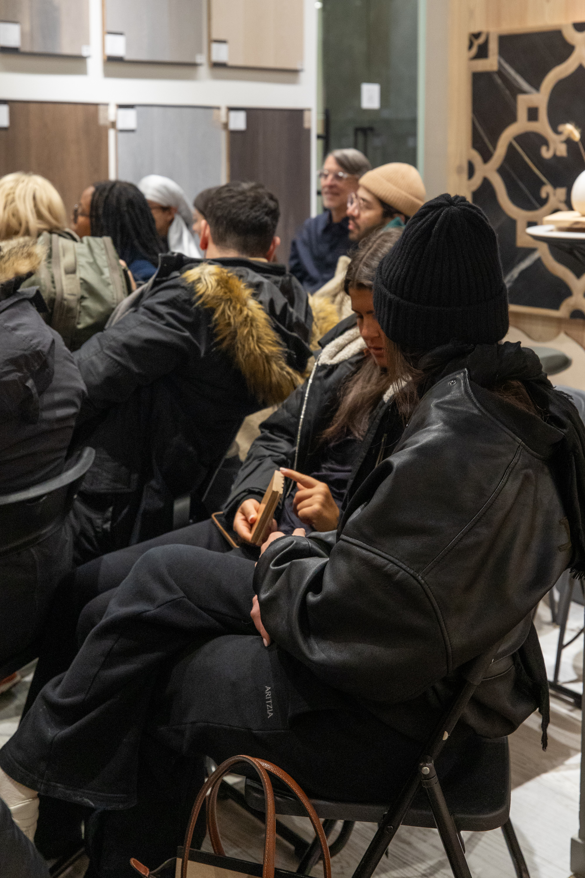 Close-up of luxury hardwood floor samples displayed during FIT design education tour
