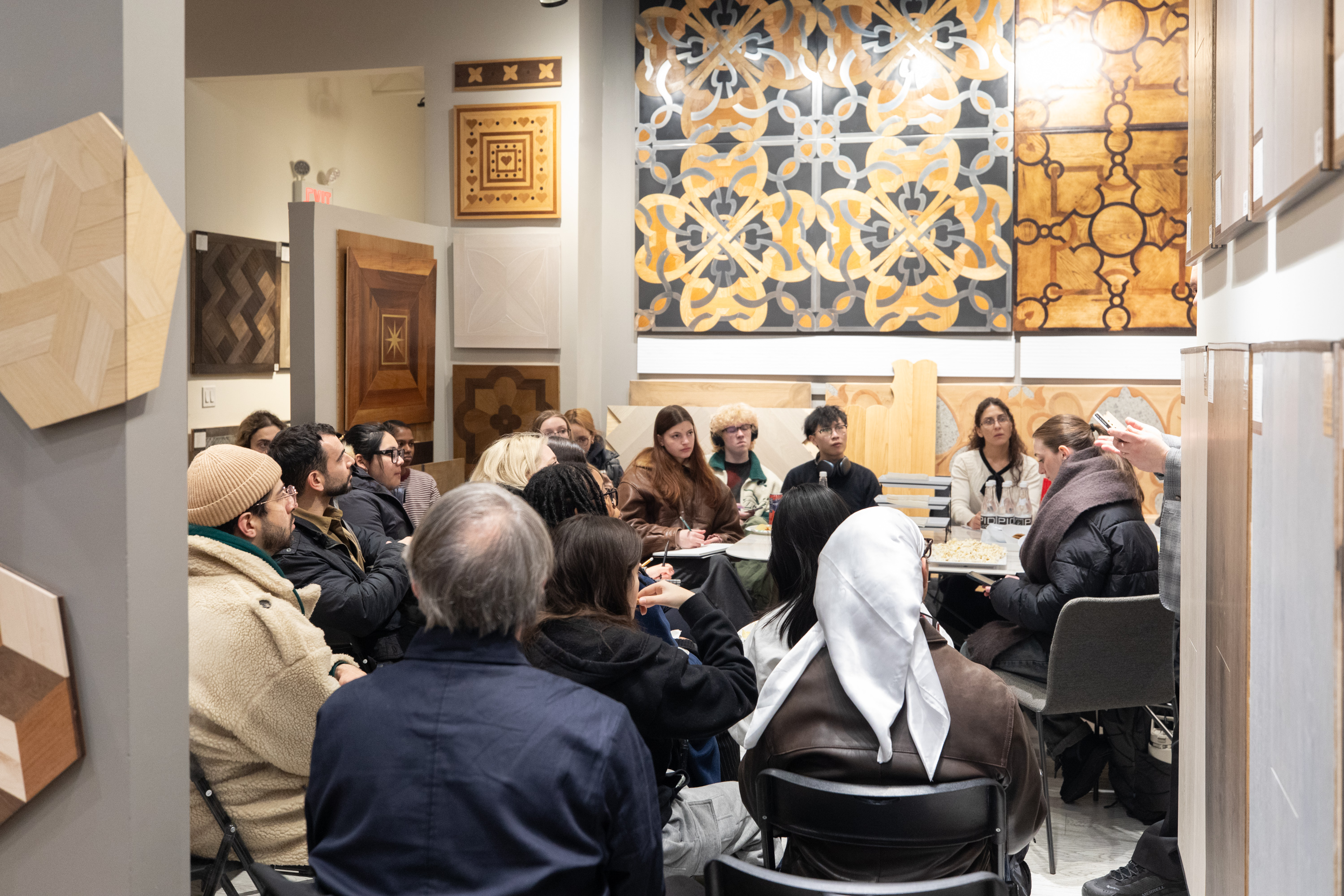 PID Floors design consultant presenting wood species selection to FIT students