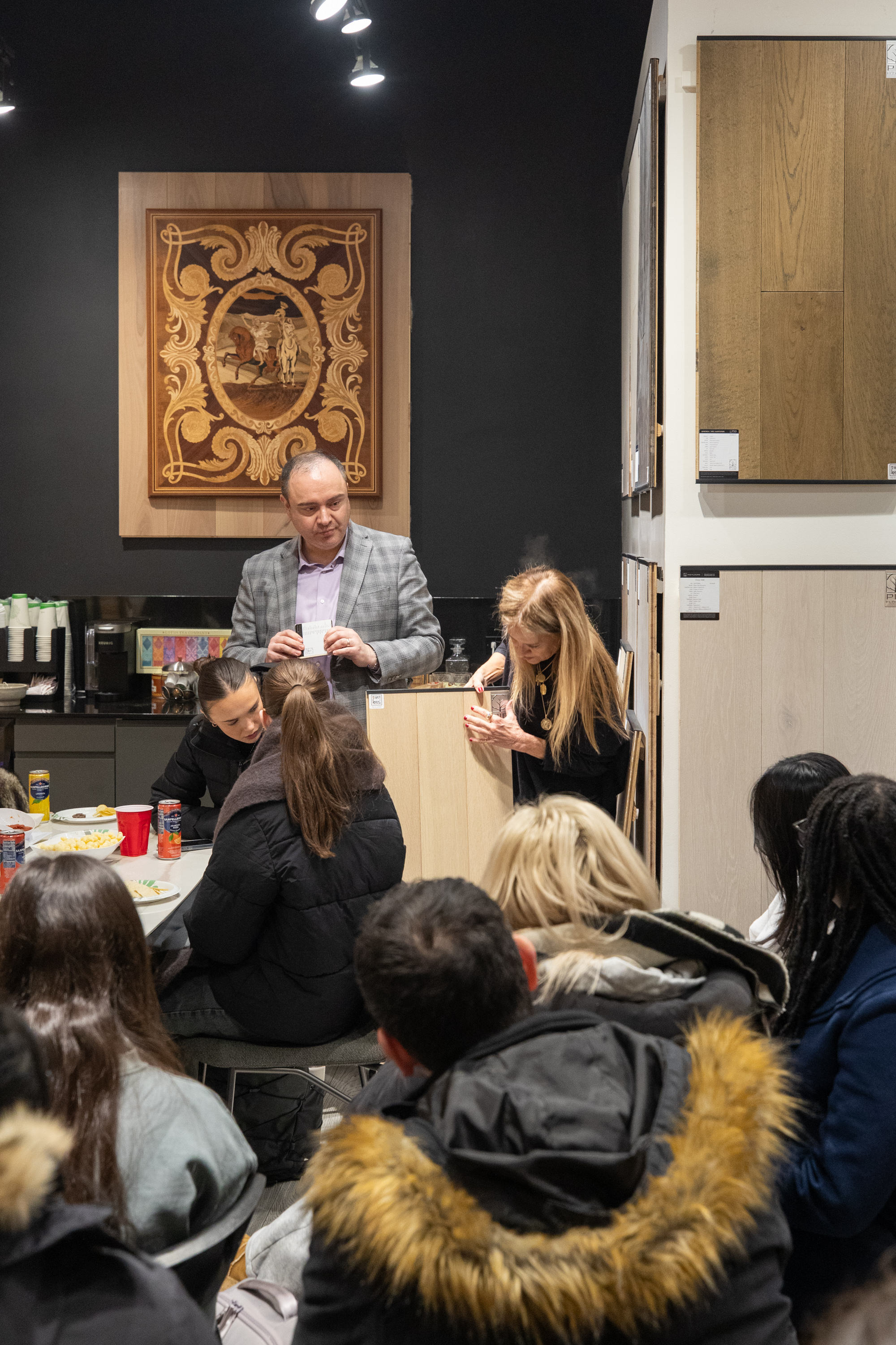 PID Floors educator presenting sustainable hardwood sourcing to FIT student group