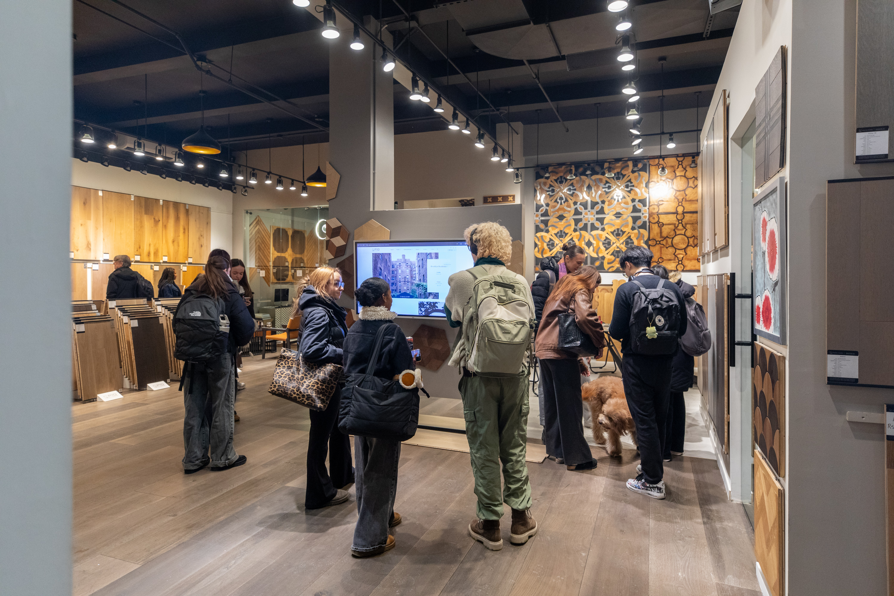 Wide view of PID Floors Manhattan showroom during FIT student design education event