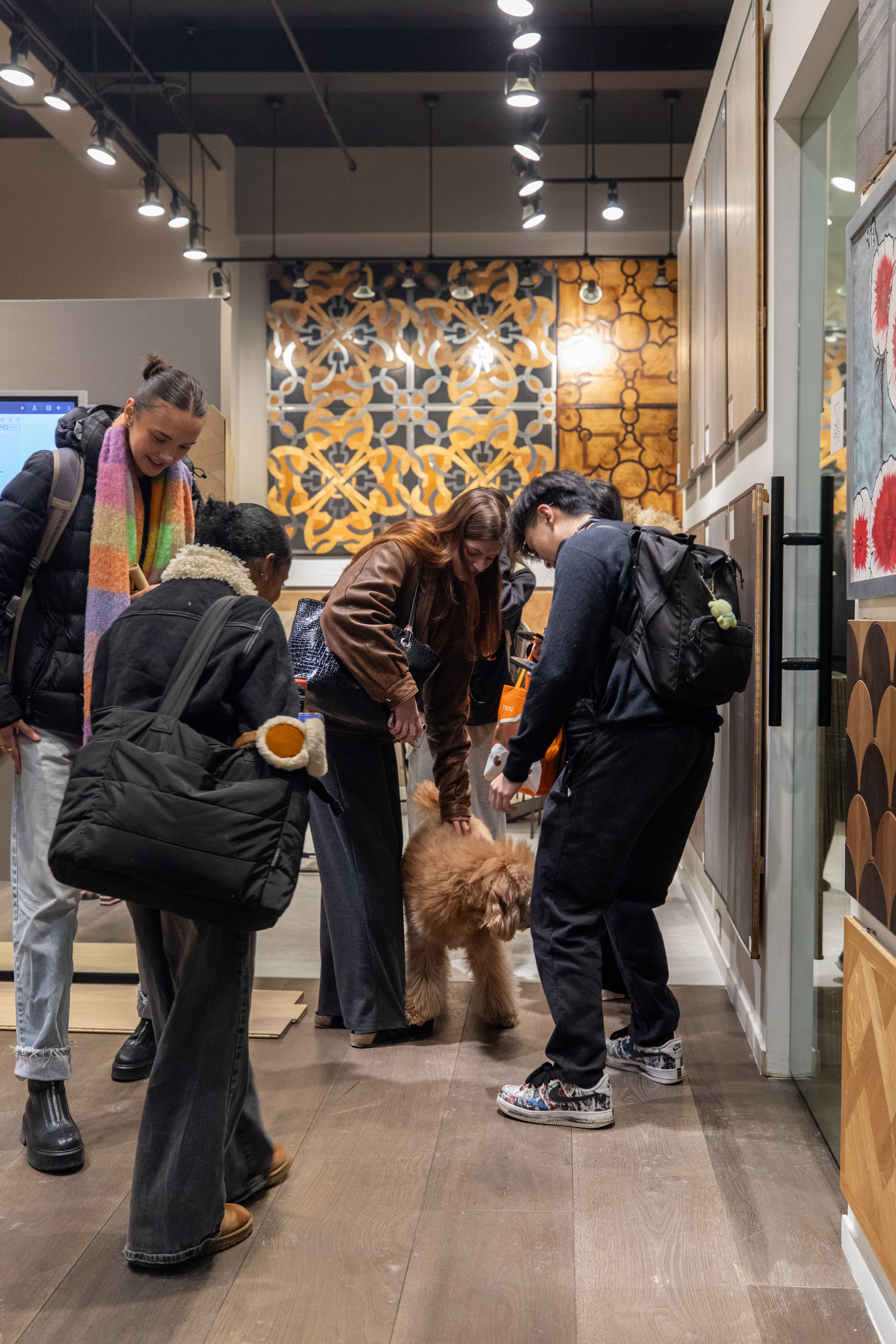 PID Floors and FIT students gathered for group photo inside NYC flagship showroom