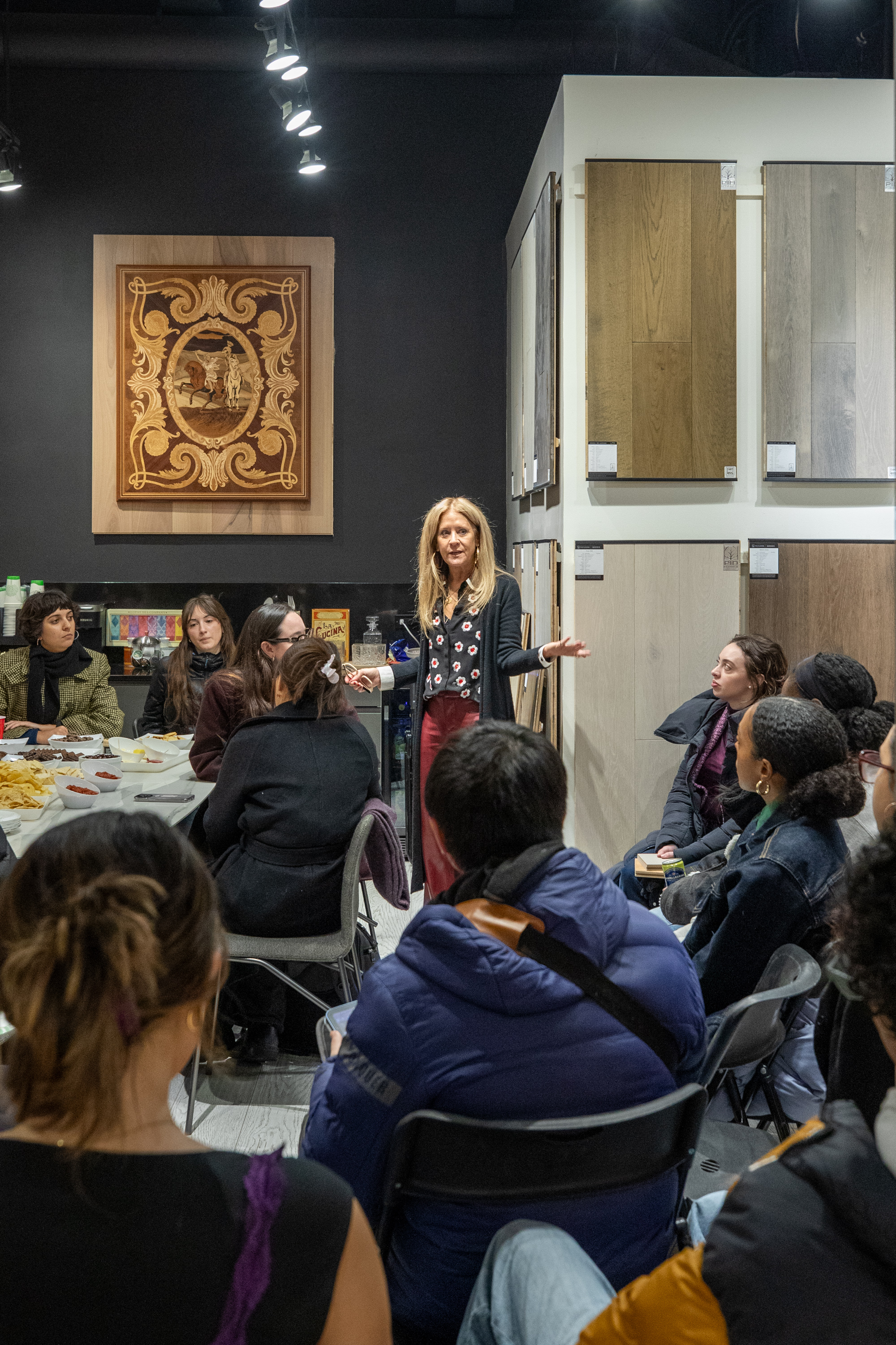 PID Floors luxury hardwood flooring samples arranged on table for FIT student review