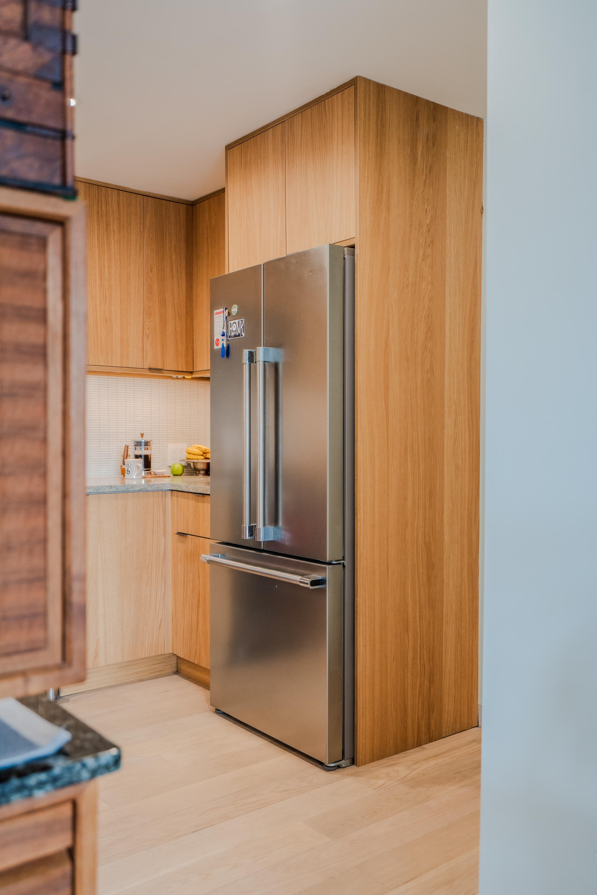 210 East Broadway kitchen featuring PID Floors luxury plank flooring