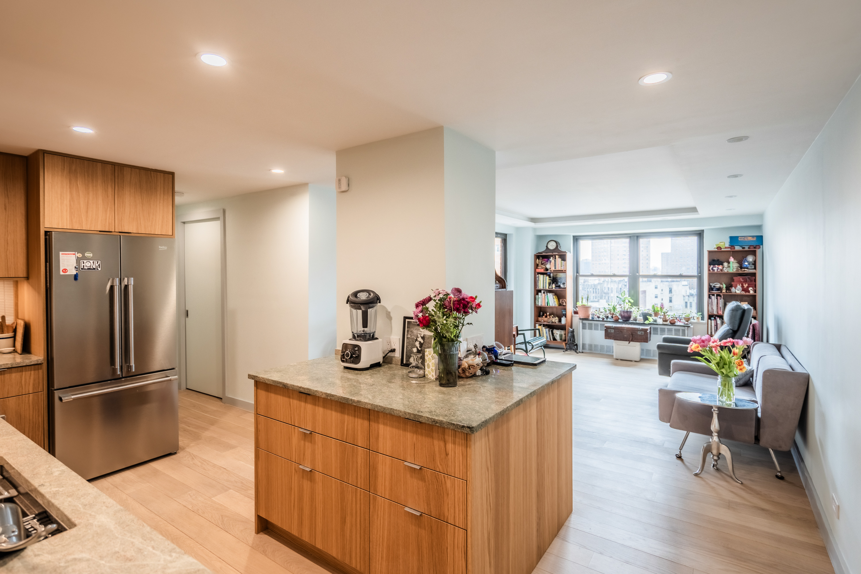 210 East Broadway open-plan living area with PID Floors custom wood flooring