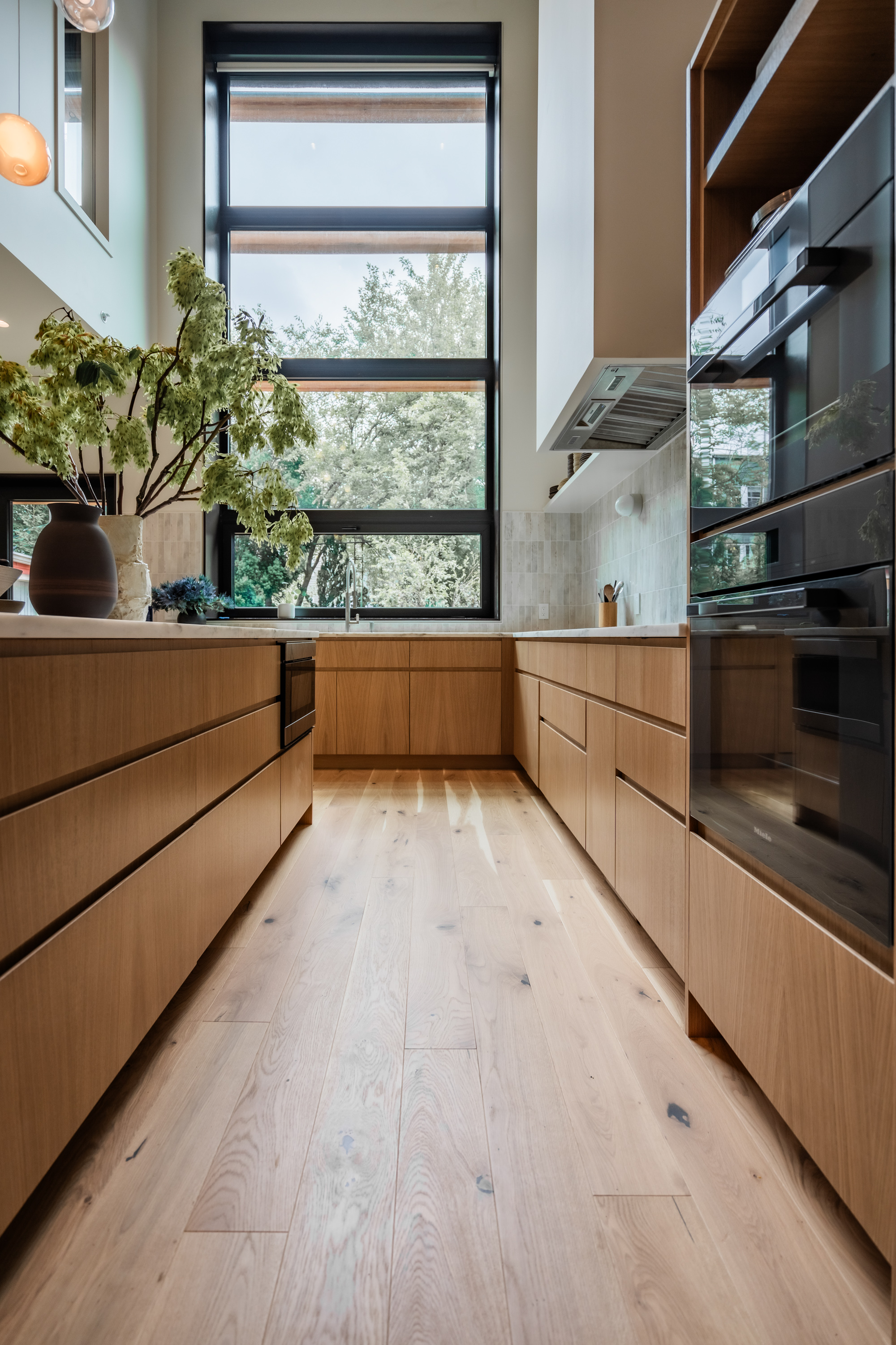 Wide plank hardwood flooring by PID Floors installed at Java Haus