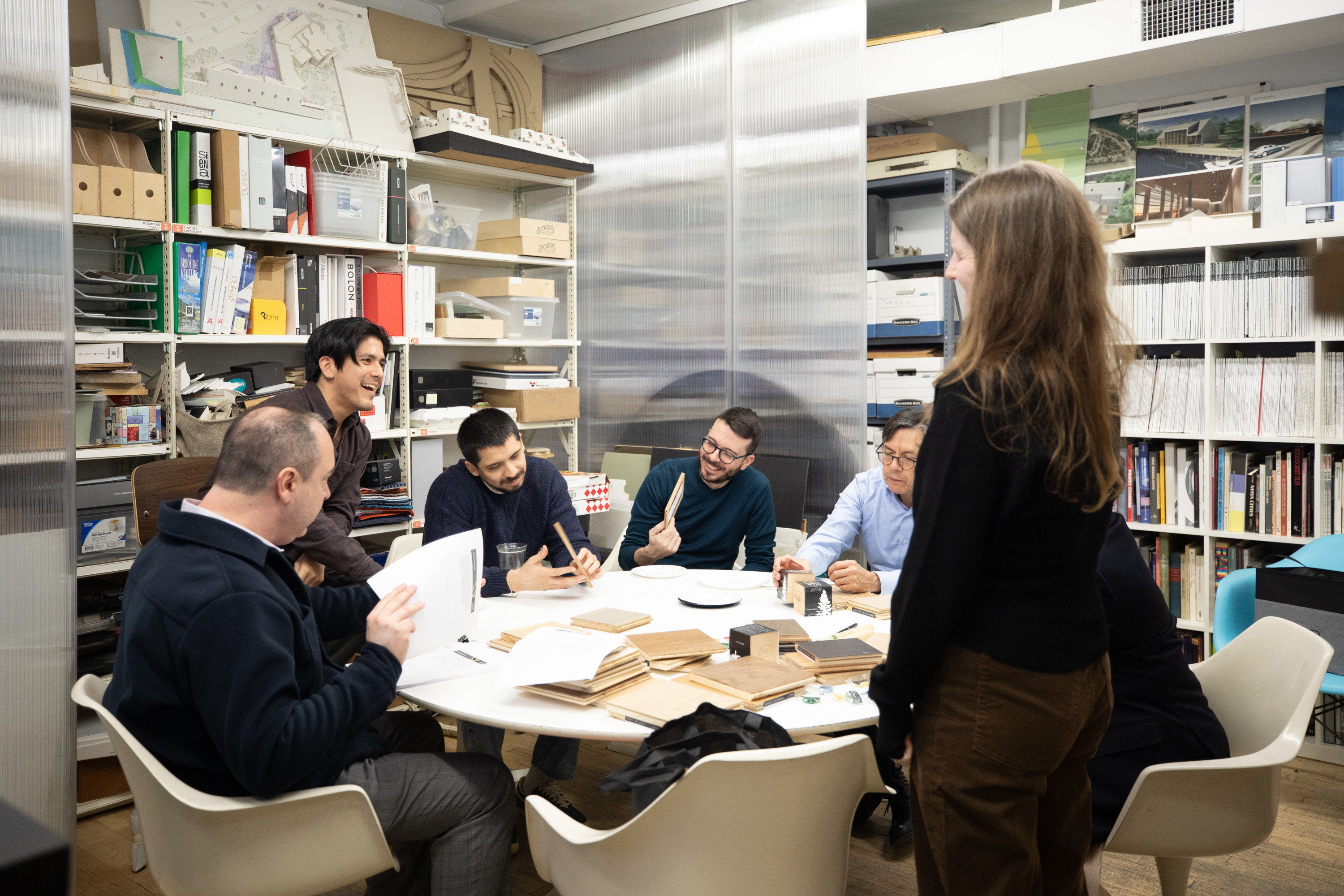 Architects examining luxury wood flooring samples at PID Floors Lunch & Learn with Ricardo Zurita Architecture