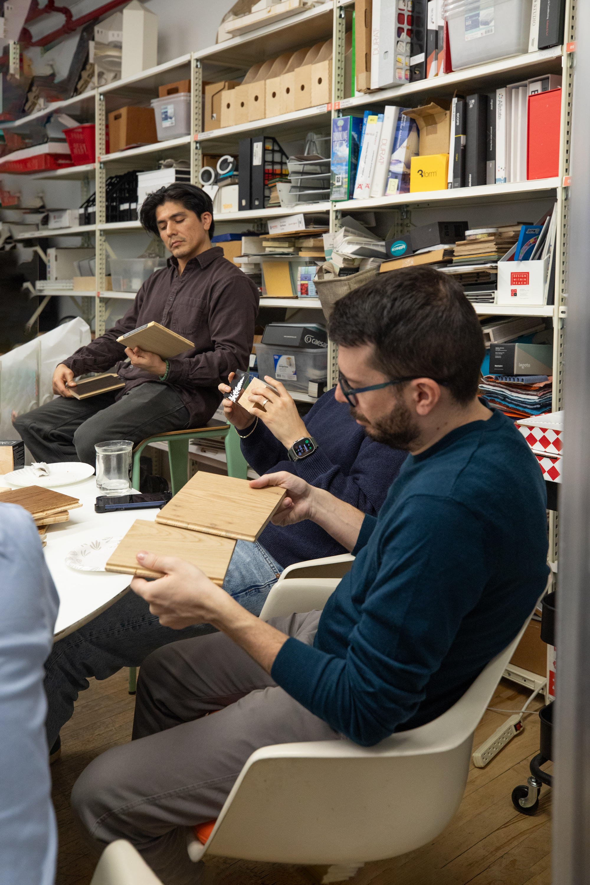 Architectural professionals reviewing PID Floors luxury hardwood products during NYC educational session