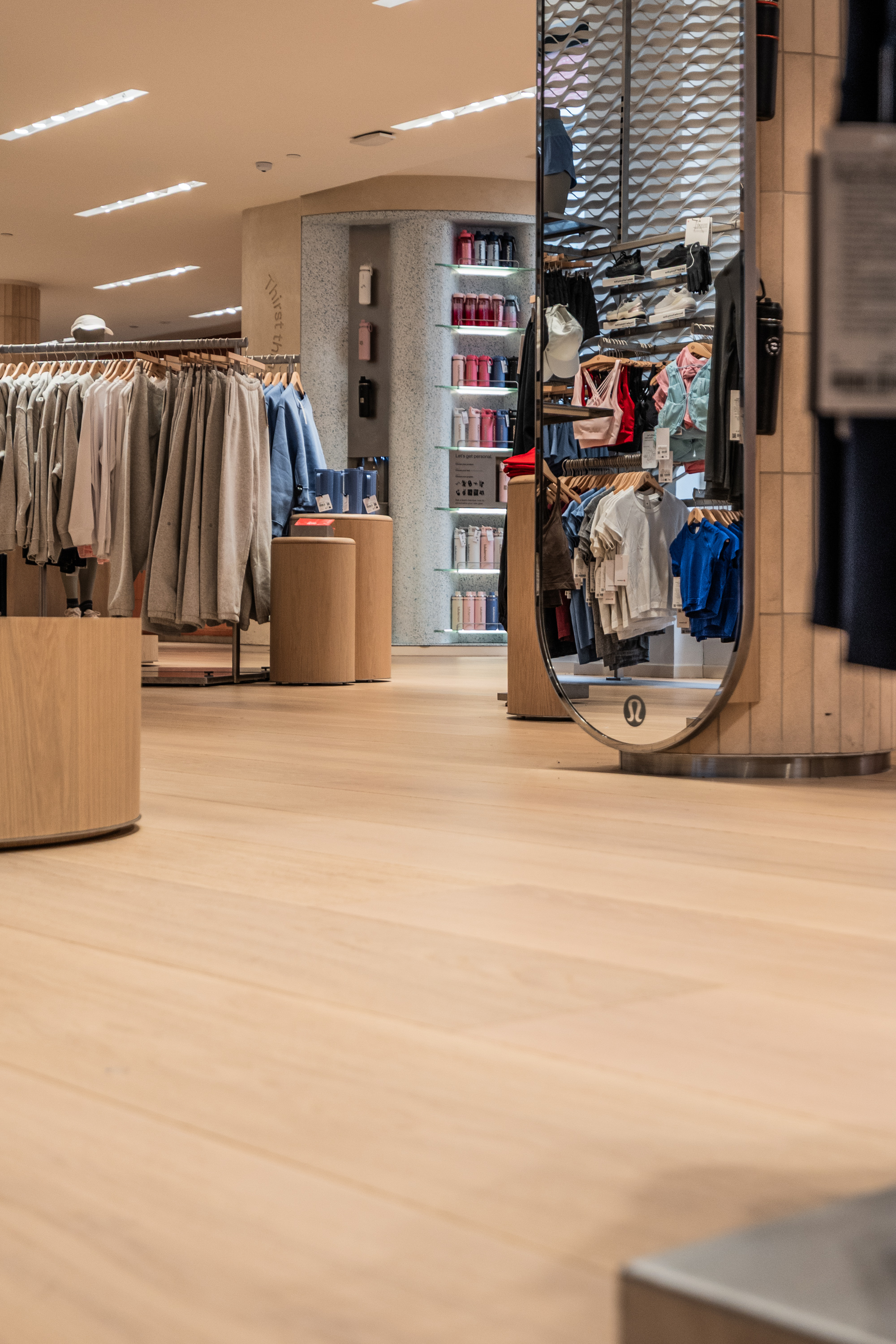 Wide-angle view of PID Floors premium hardwood installation at lululemon SoHo New York flagship
