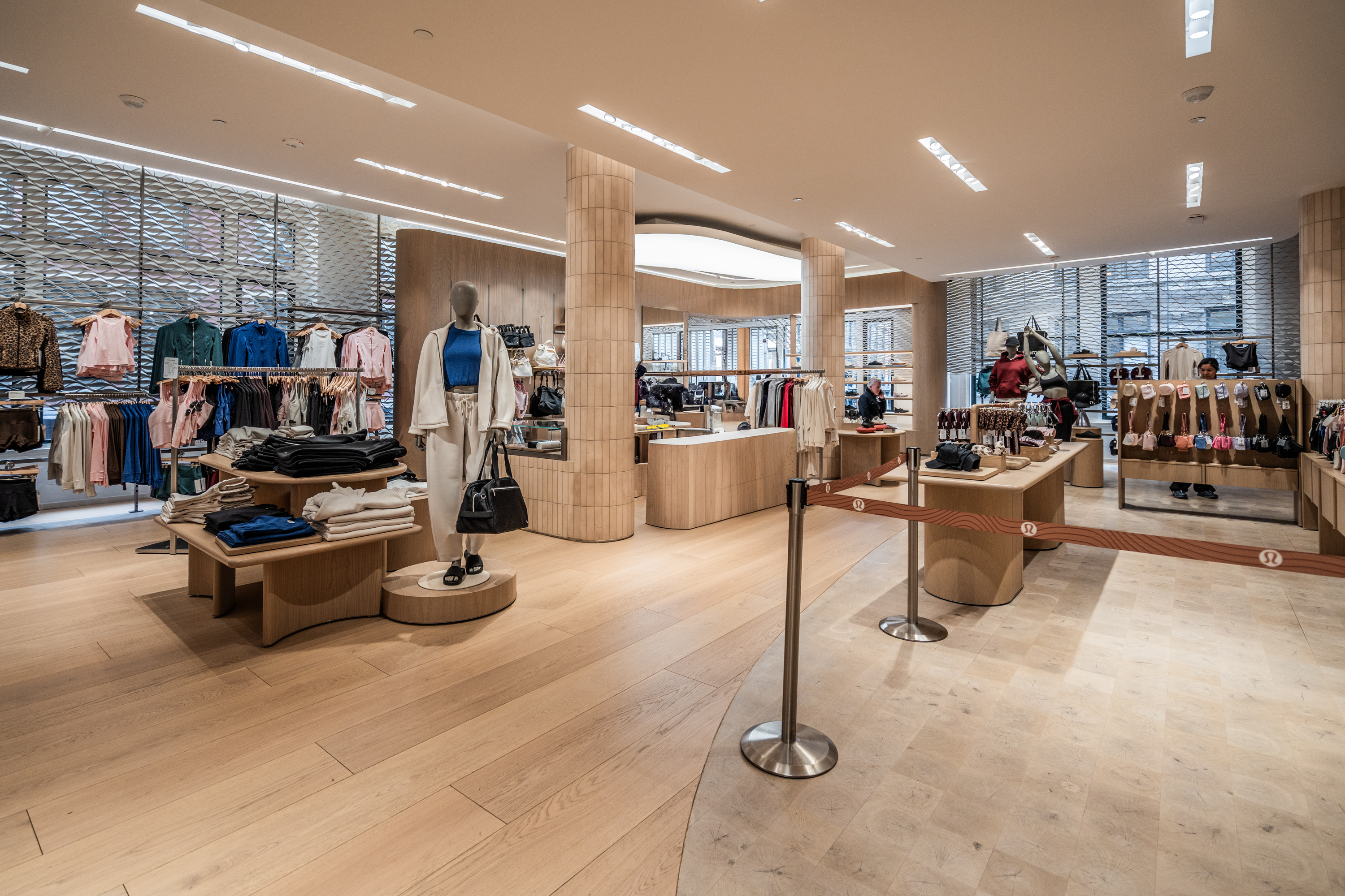Luxury hardwood plank detailing by PID Floors at lululemon SoHo athletic apparel boutique