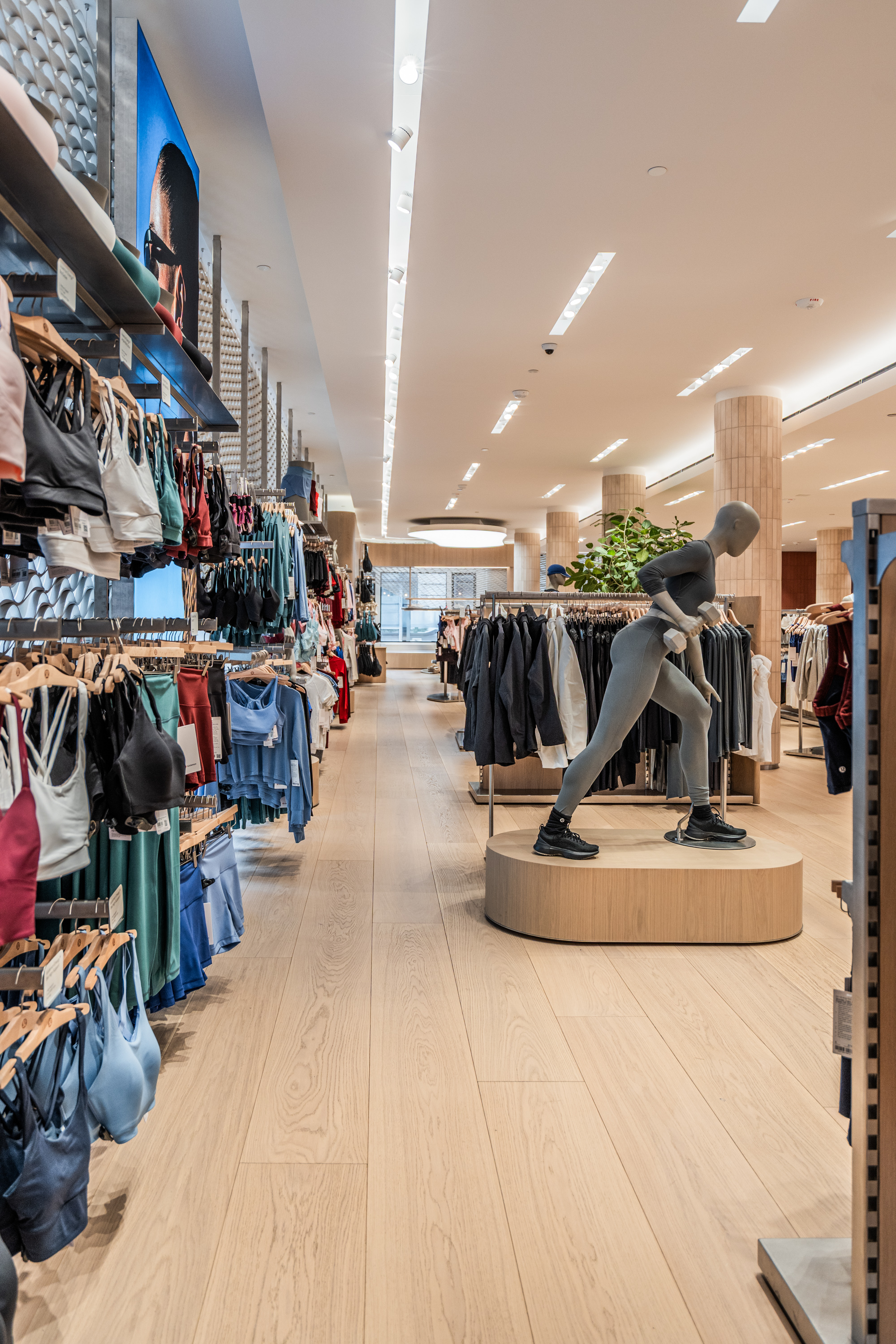 PID Floors commercial-grade luxury wood flooring at lululemon SoHo retail interior