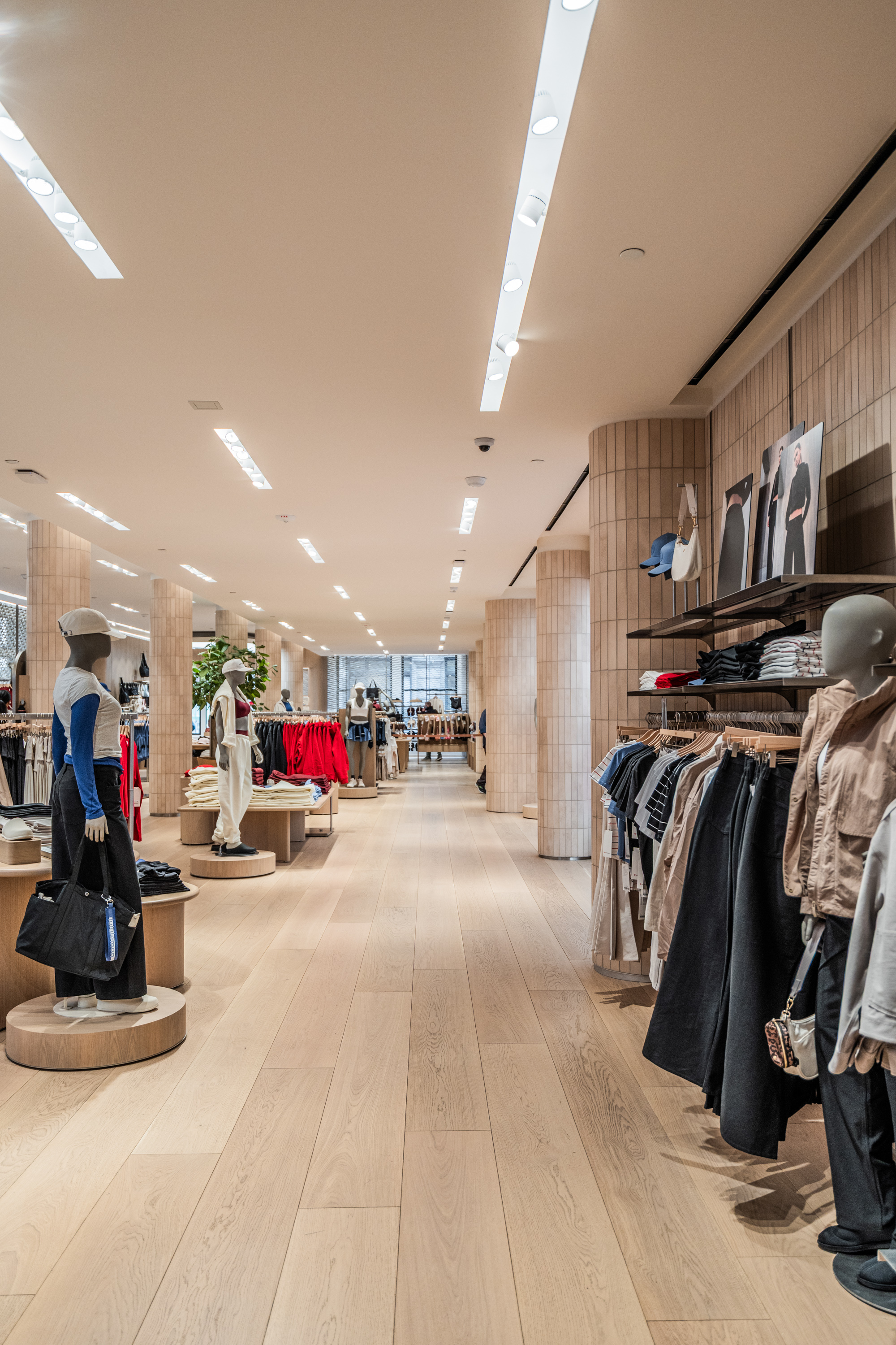 Premium wide-plank wood floors by PID Floors throughout lululemon SoHo commercial space